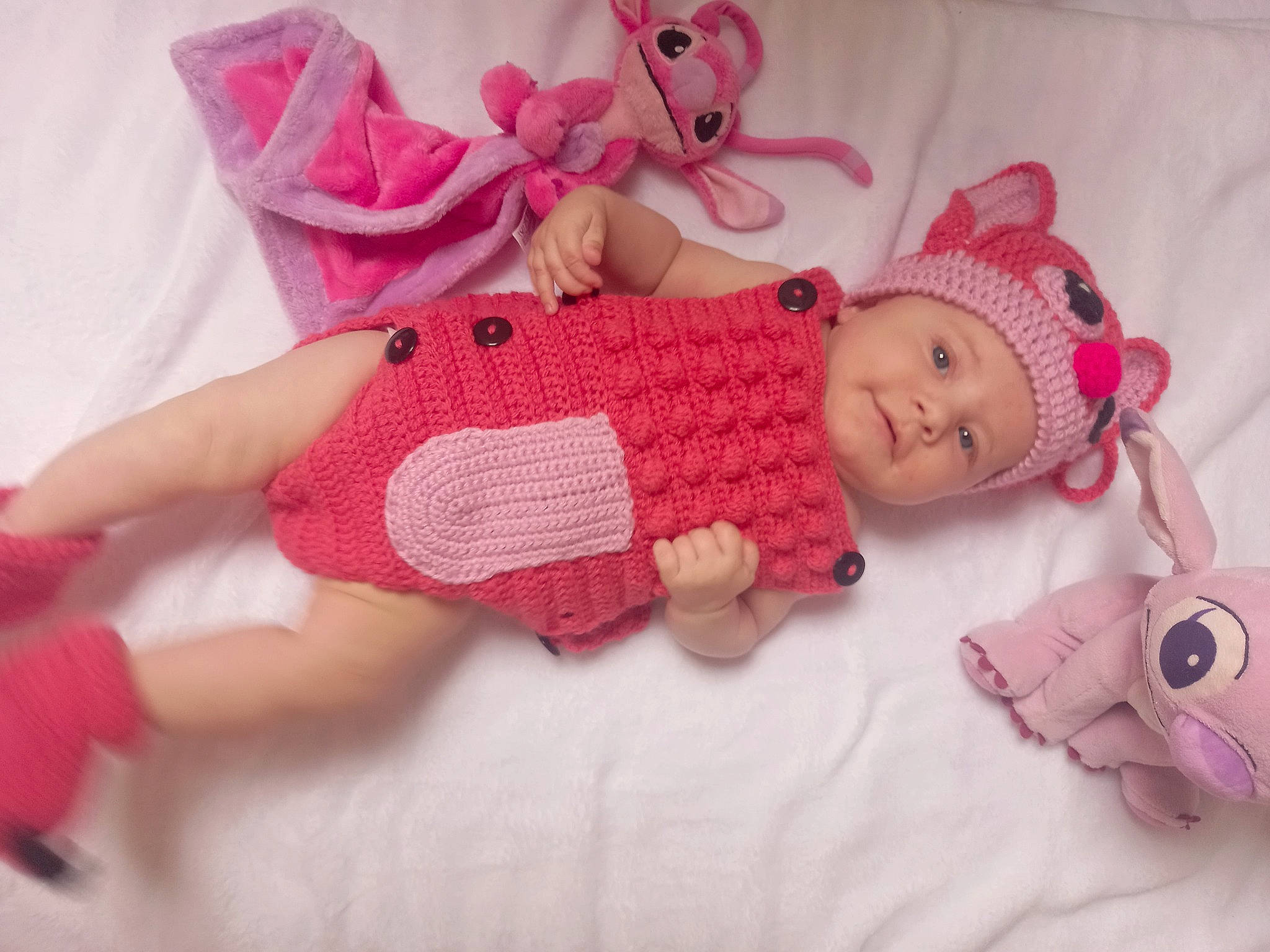 Kyara a rejoint le concours — aidez-le/la à gagner de superbes lots ! art, baby, baby_products, baby_toddler_clothing, cheek, craft, creative_arts, doll, eye, fawn, head, headwear, linens, magenta, pattern, person, pink, sleeve, sock, textile