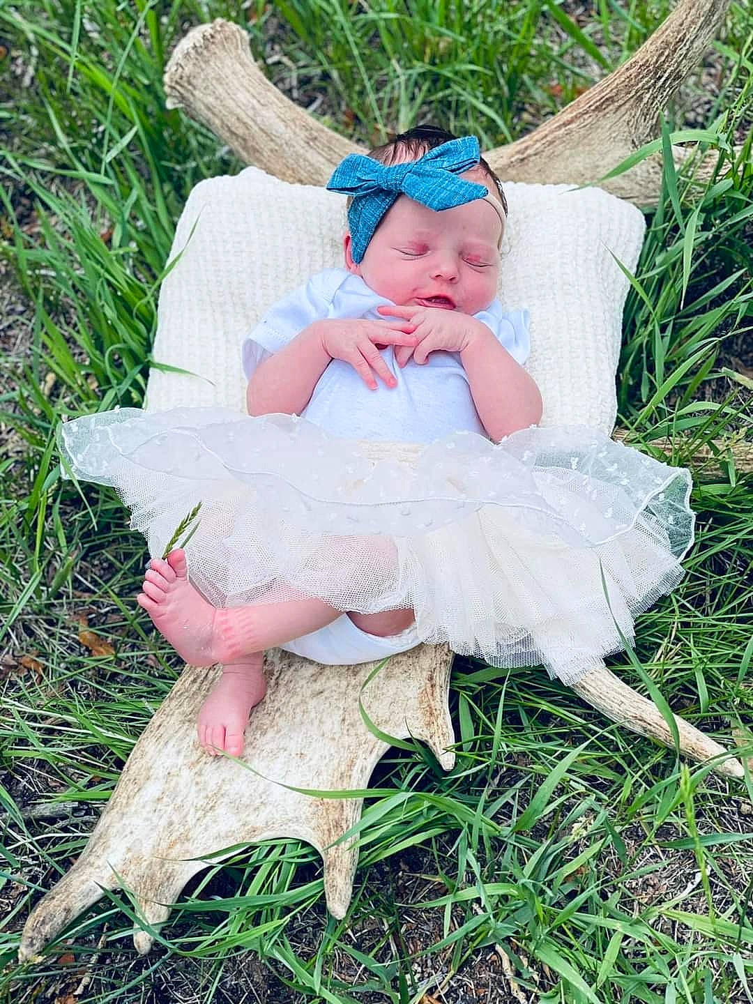 Mackenna joined the competition — help win amazing prizes! baby, baby_toddler_clothing, child, event, fashion_accessory, fun, grass, grassland, hair_accessory, happy, headband, headpiece, headwear, lawn, mythical_creature, pattern, people_in_nature, person, pink, plant