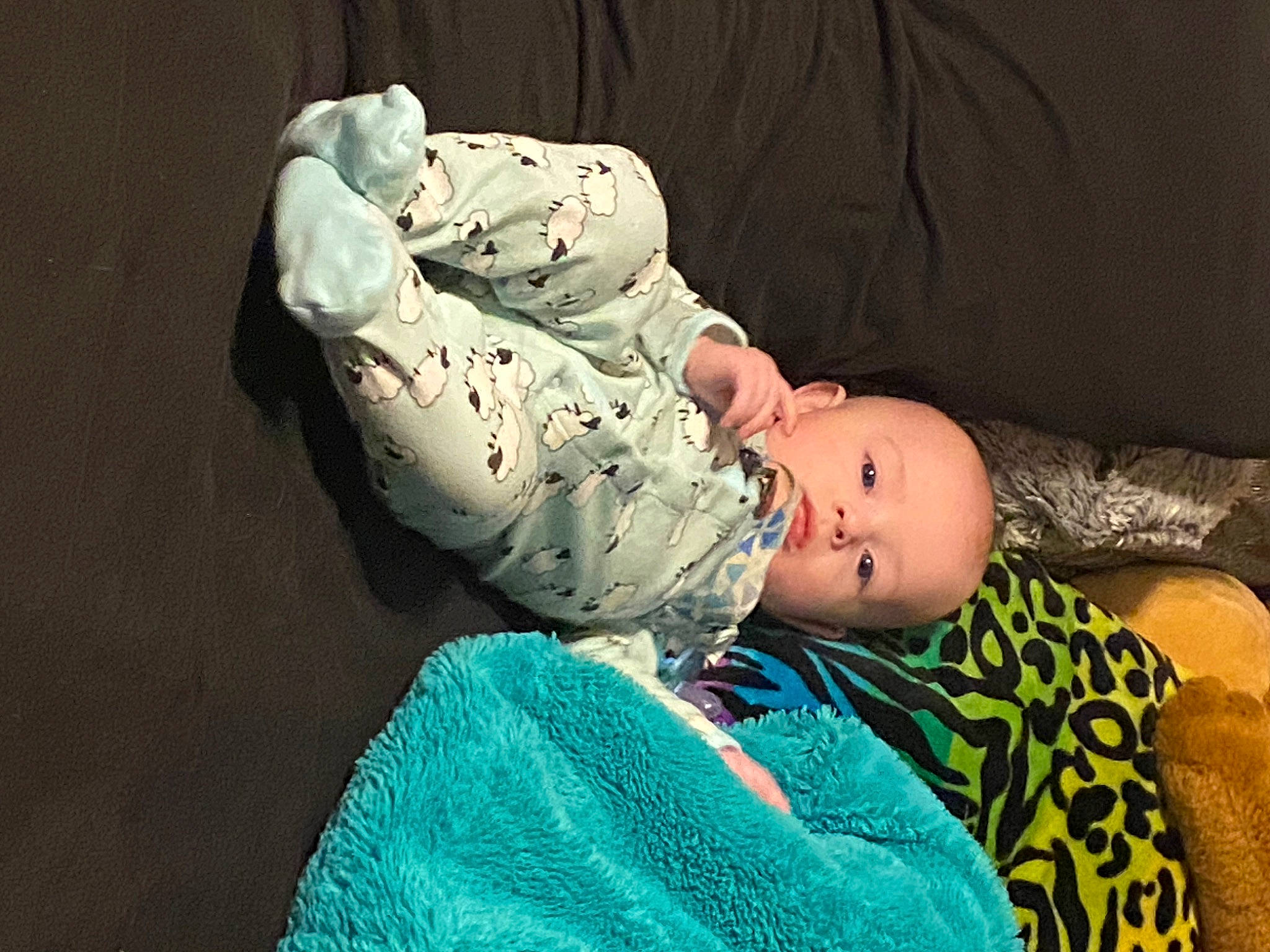 River is registered to the contest to win money with this photo: baby, baby_toddler_clothing, chair, child, comfort, flash_photography, hat, human_body, linens, pattern, person, personal_protective_equipment, portrait_photography, room, sitting, sleep, toddler