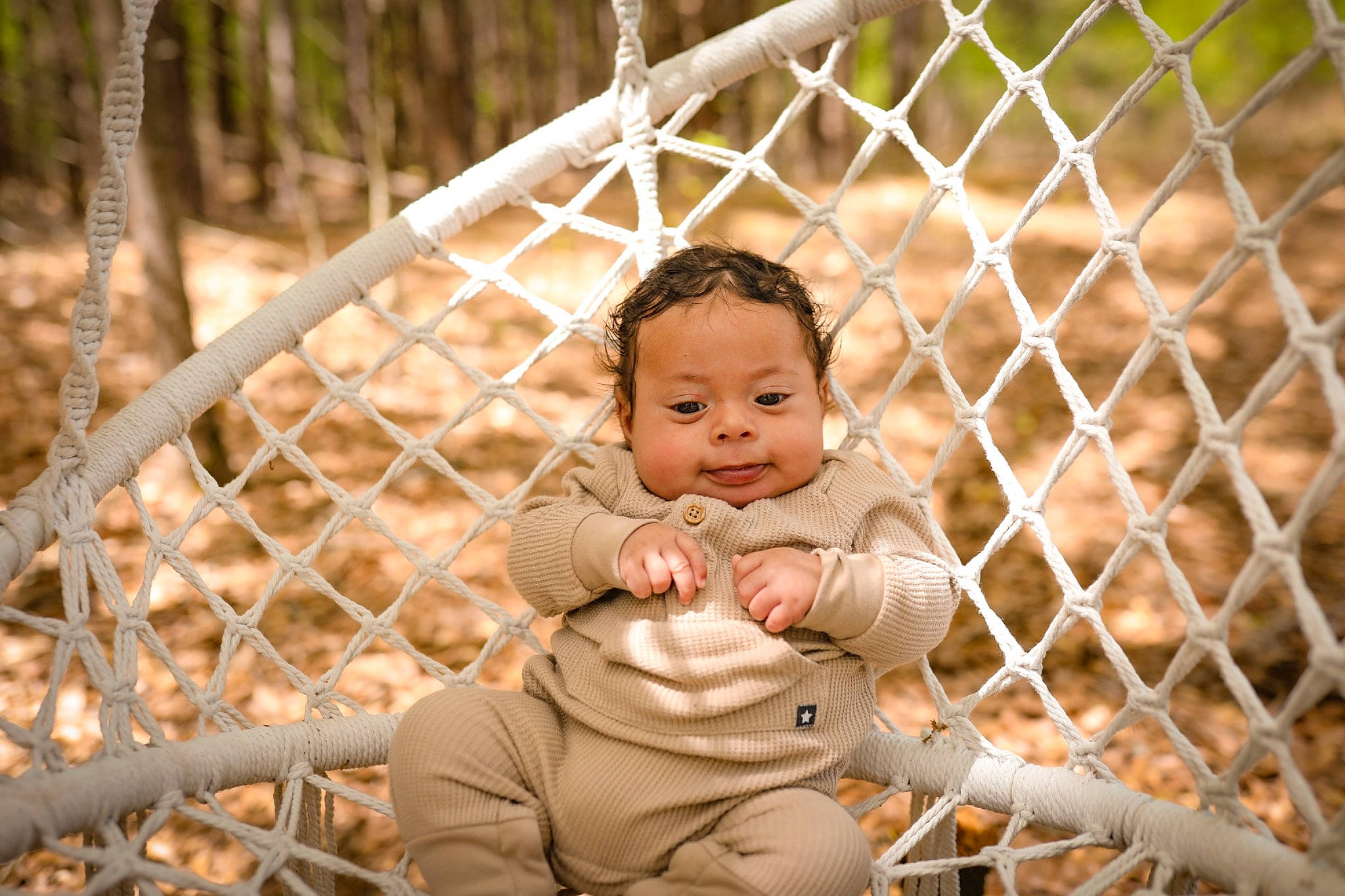 Kaysten joined the competition — help win amazing prizes! baby, chain_link_fencing, child, fawn, fence, fun, grass, happy, leisure, mesh, people_in_nature, person, plant, recreation, sitting, smile, toddler, tree, wildlife, wire_fencing