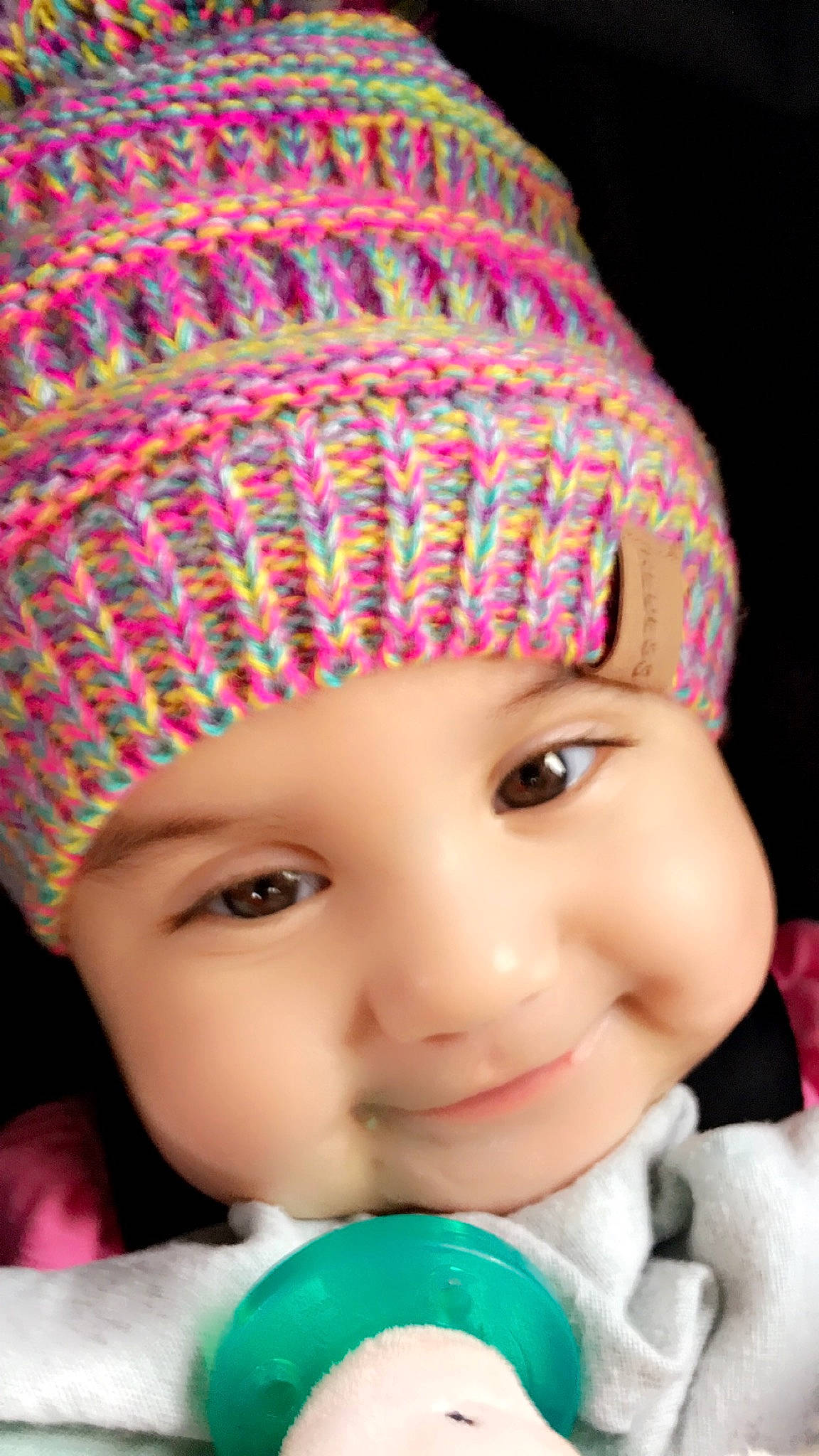 Charlie joined the competition — help win amazing prizes! baby_toddler_clothing, beauty, cheek, child, eye, eyebrow, face, happy, headgear, headwear, joy, knit_cap, knitting, lip, magenta, nose, person, pink, spoon, textile
