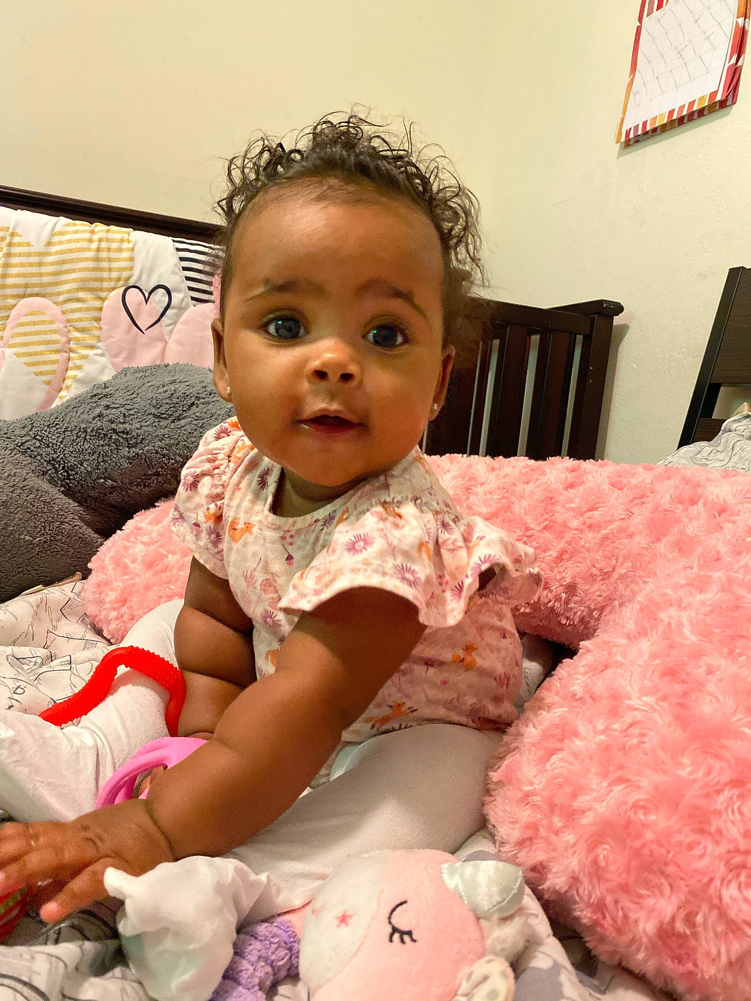 Brittany joined the competition — help win amazing prizes! baby, baby_toddler_clothing, cheek, child, comfort, couch, dress, eye, face, flooring, fun, hairstyle, happy, head, person, pink, room, sitting, skin, smile