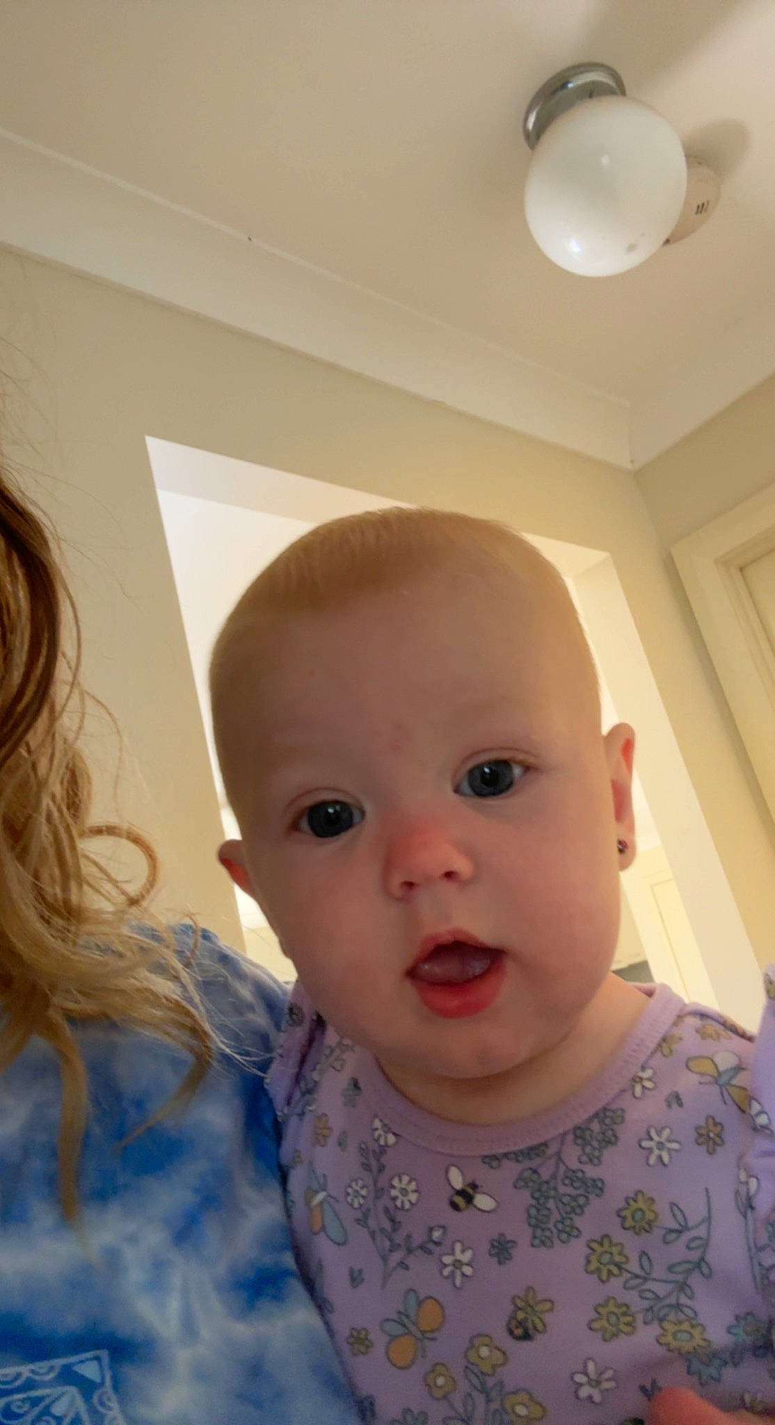 Gabriella is registered to the contest to win money with this photo: baby, baby_toddler_clothing, cheek, chin, ear, eye, eyebrow, eyelash, happy, head, iris, lip, mouth, neck, nose, person, shoulder, skin, sleeve, standing