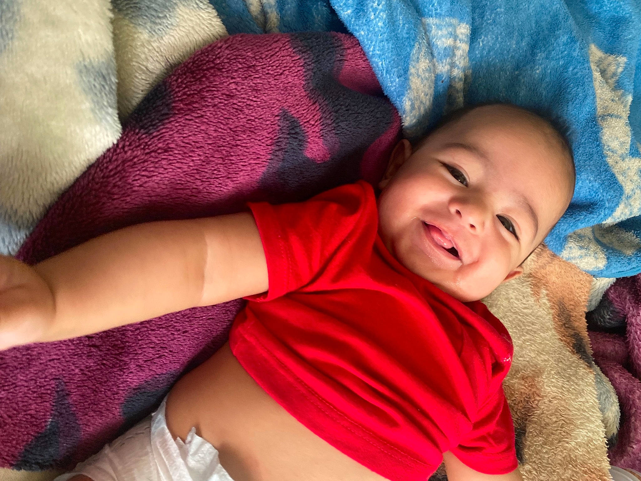 Kyrie is registered to the contest to win money with this photo: comfort, cool, elbow, facial_expression, finger, hand, happy, human_body, lip, mouth, muscle, neck, person, pink, product, skin, sleeve, smile, textile, thigh