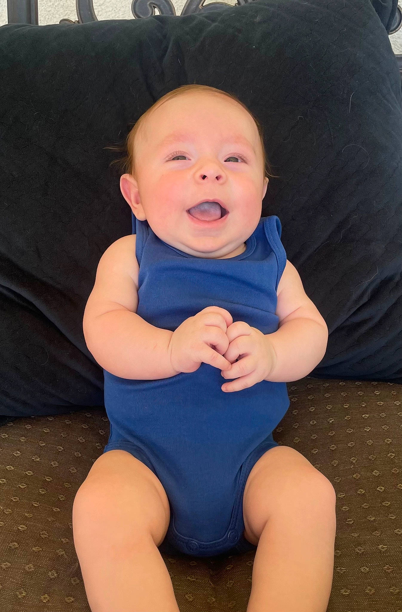 Jimmy is registered to the contest to win money with this photo: azure, baby, baby_toddler_clothing, comfort, eye, face, finger, flash_photography, happy, head, human_body, iris, knee, leg, person, skin, smile, standing, thigh, thumb