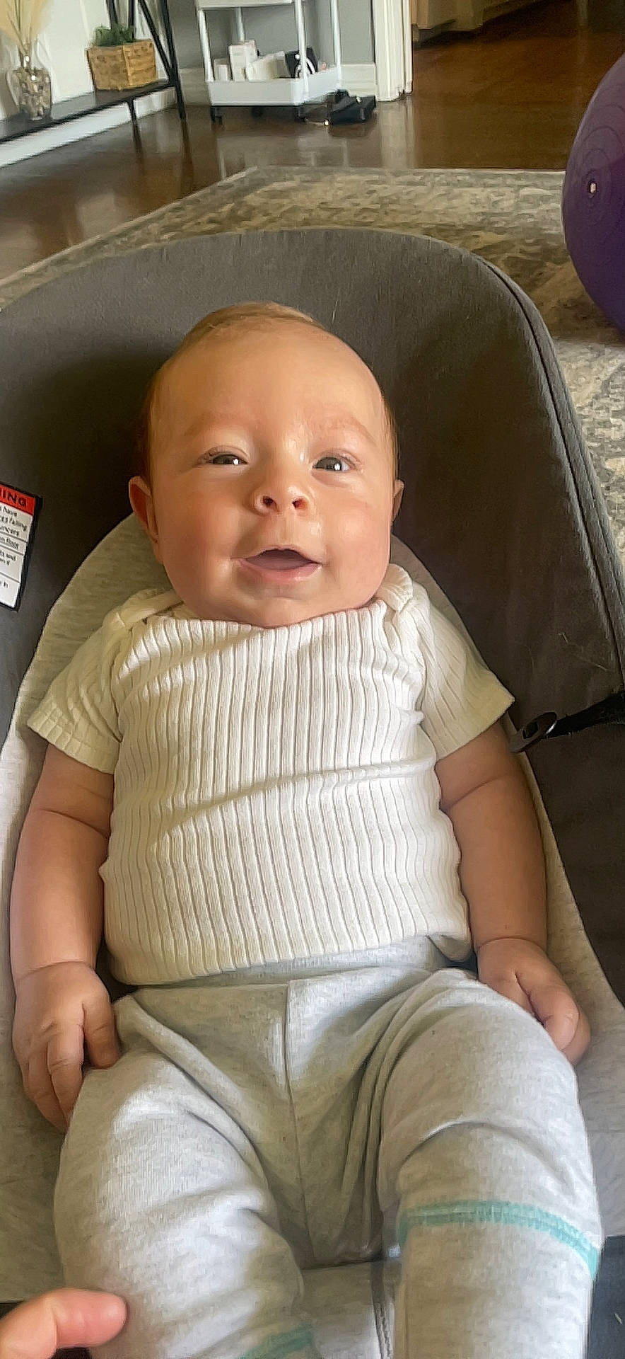 Jimmy is registered to the contest to win money with this photo: auto_part, baby, baby_products, baby_toddler_clothing, car_seat, chair, cheek, child, comfort, hairstyle, lap, lip, nose, person, seat_belt, sitting, skin, sleeve, smile, toddler