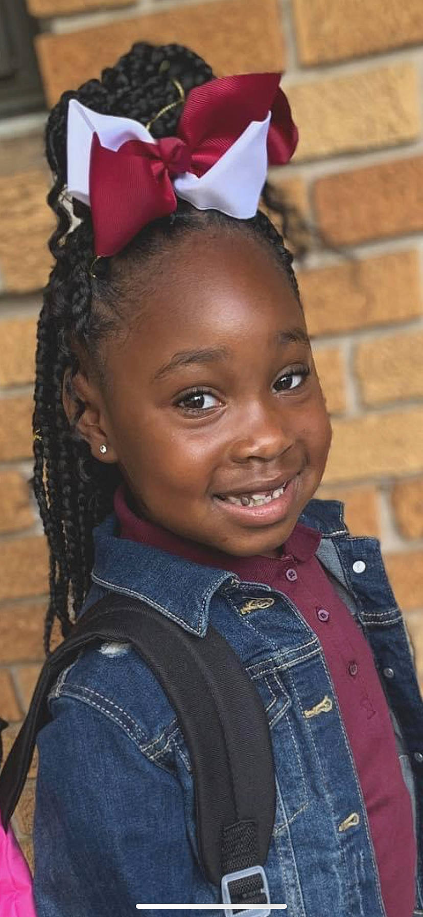 Kyleigh is registered to the contest to win money with this photo: black_hair, brick, child, chin, cool, cornrows, denim, event, facial_expression, forehead, fun, hairstyle, happy, jewellery, joy, lip, organ, person, skin, smile