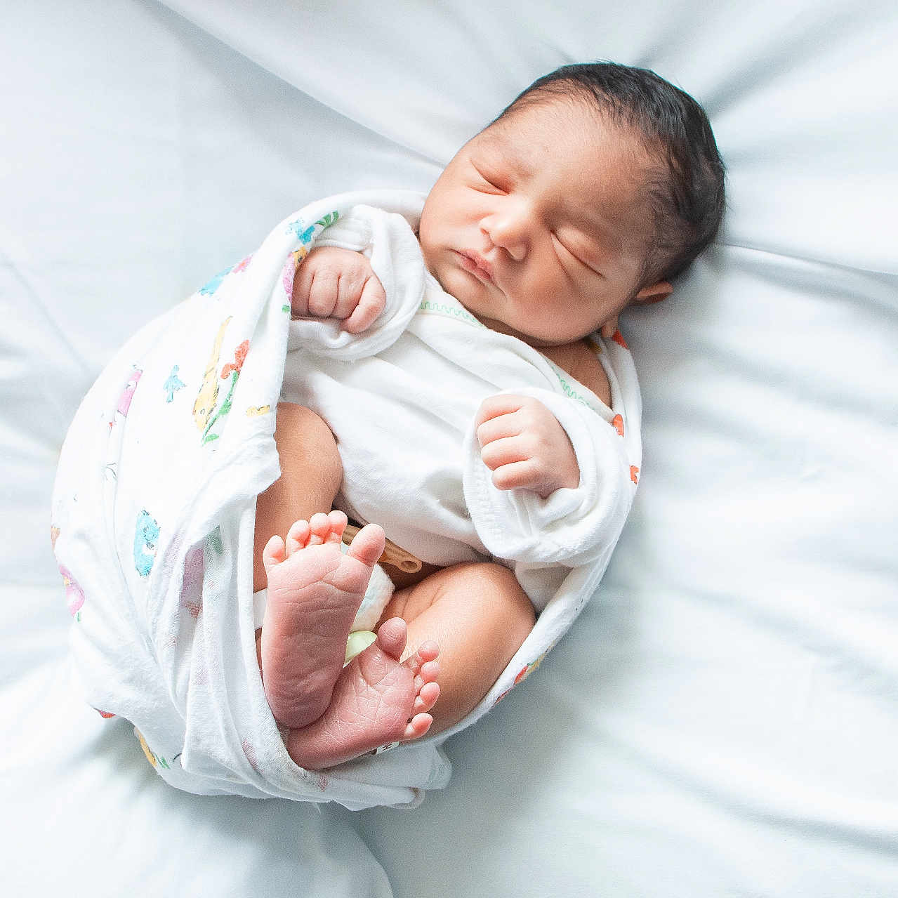 Syed joined the competition — help win amazing prizes! baby, bed, blanket, child, cozy, cute, foot, hand, indoors, infant, newborn, peaceful, person, portrait, resting, skin, sleeping, soft, white, wrapped