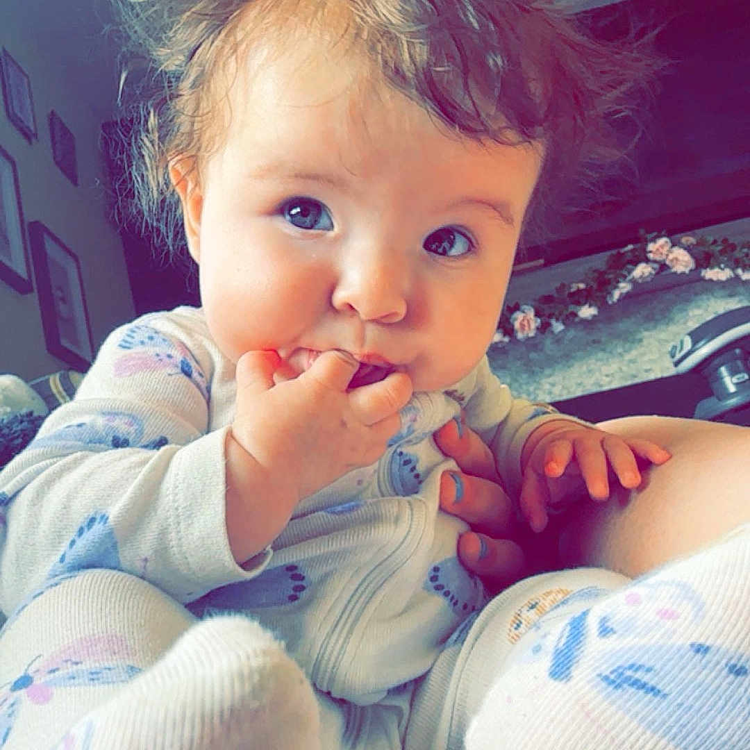 Kiara joined the competition — help win amazing prizes! baby, bed, bodypart, clothing, cutlery, face, finger, hand, head, hosiery, indoors, mouth, pajamas, person, photography, portrait, selfie, sock, spoon, teeth