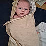 baby, blanket, calm, child, curious, expression, eyes, fabric, face, floor, hooded_towel, indoor, infant, newborn, person, portrait, skin, soft, towel, wrapped