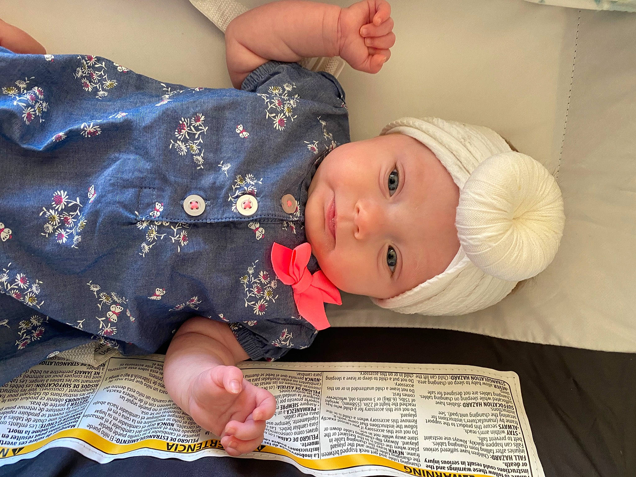 Kinslee is registered to the contest to win money with this photo: baby, baby_products, baby_toddler_clothing, carmine, child, comfort, finger, hat, headwear, linens, nail, pattern, person, sitting, sleeve, toddler, writing