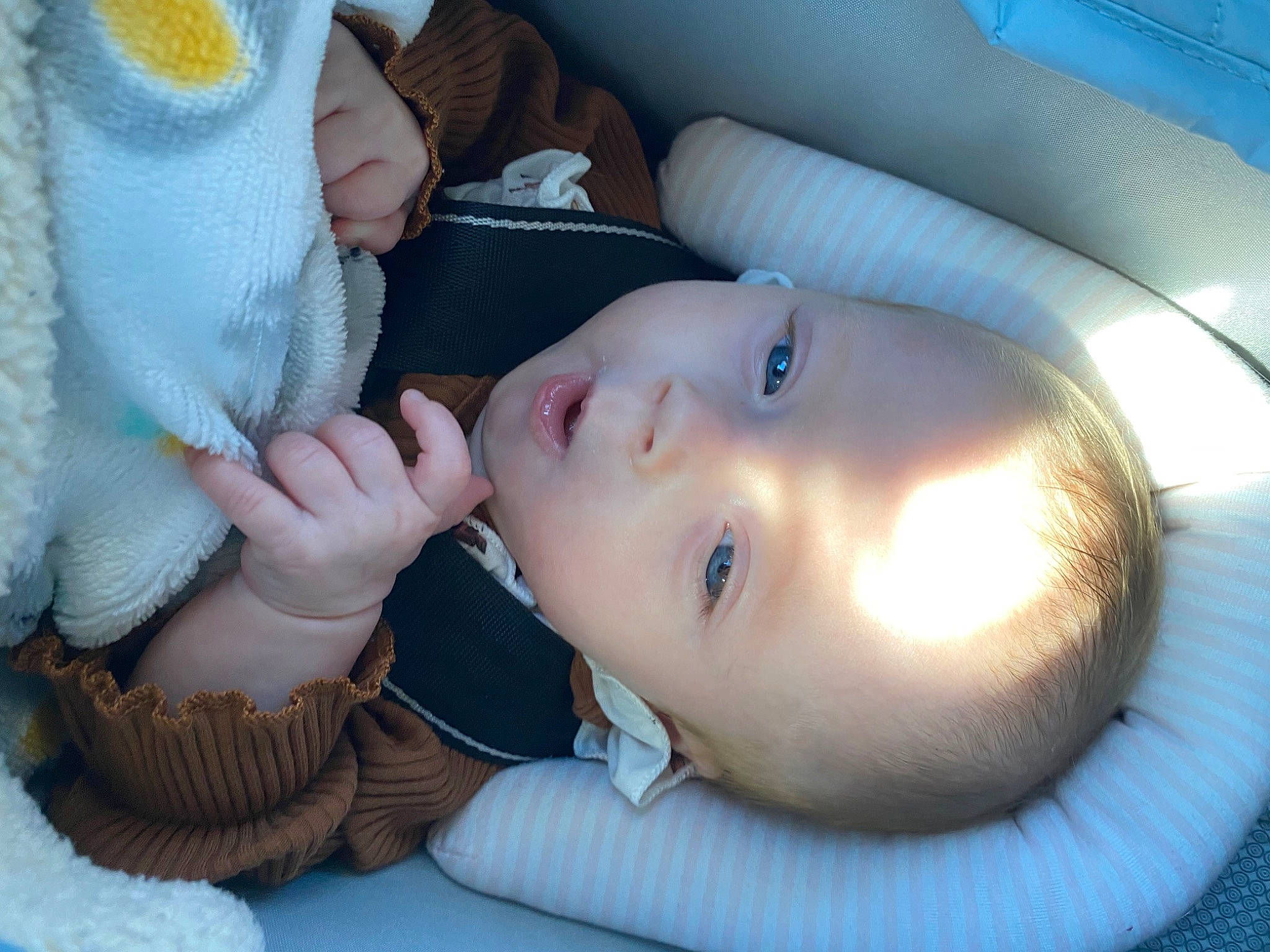 Kinslee joined the competition — help win amazing prizes! baby, baby_products, baby_toddler_clothing, cheek, child, close_up, comfort, eyelash, finger, flash_photography, mouth, nail, nose, organ, pattern, person, product, sitting, skin, toddler