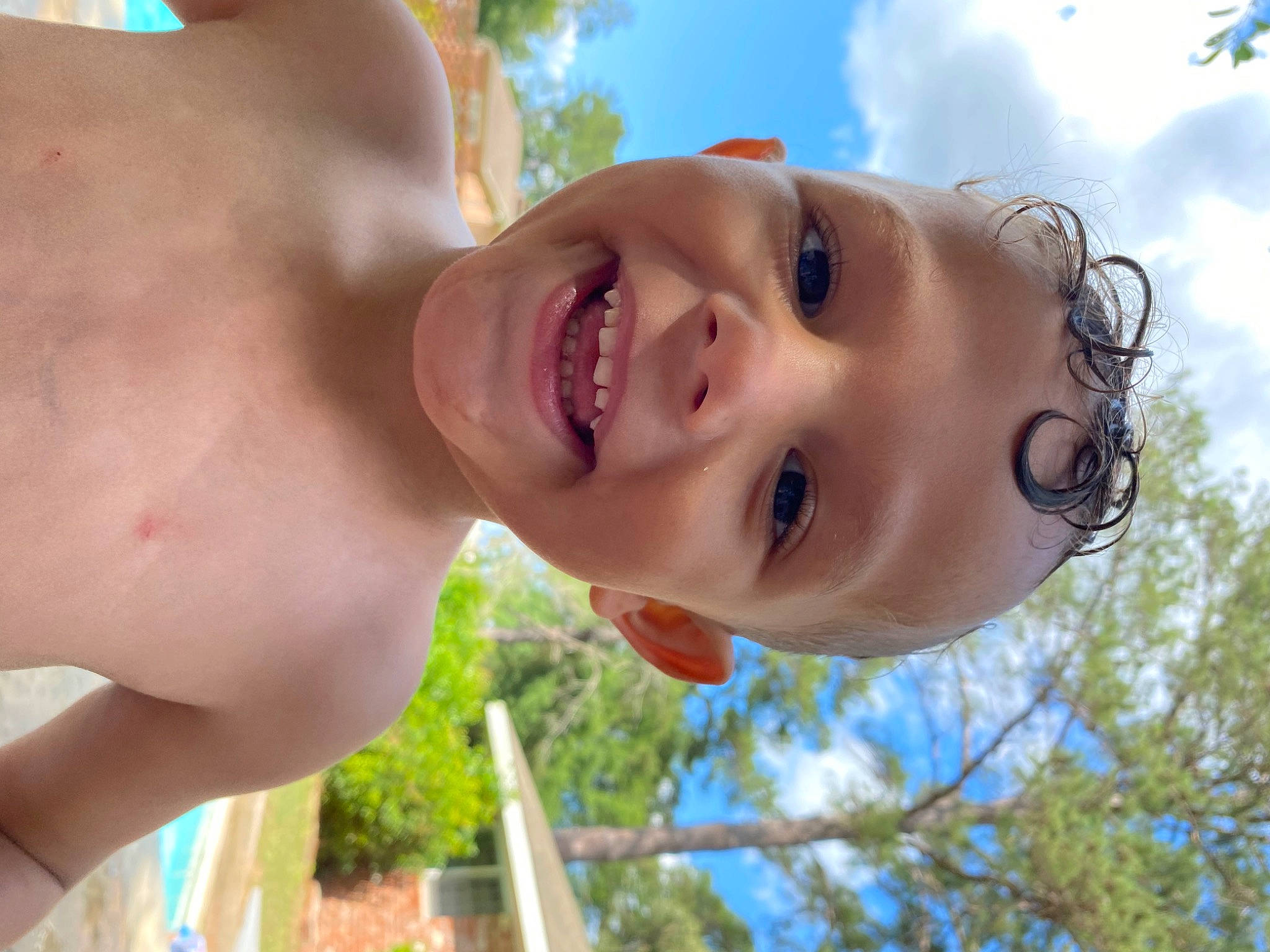 Niko is registered to the contest to win money with this photo: child, cloud, face, flash_photography, fun, grass, happy, hat, joy, leisure, lip, nose, people_in_nature, person, recreation, skin, sky, smile, summer, sunlight