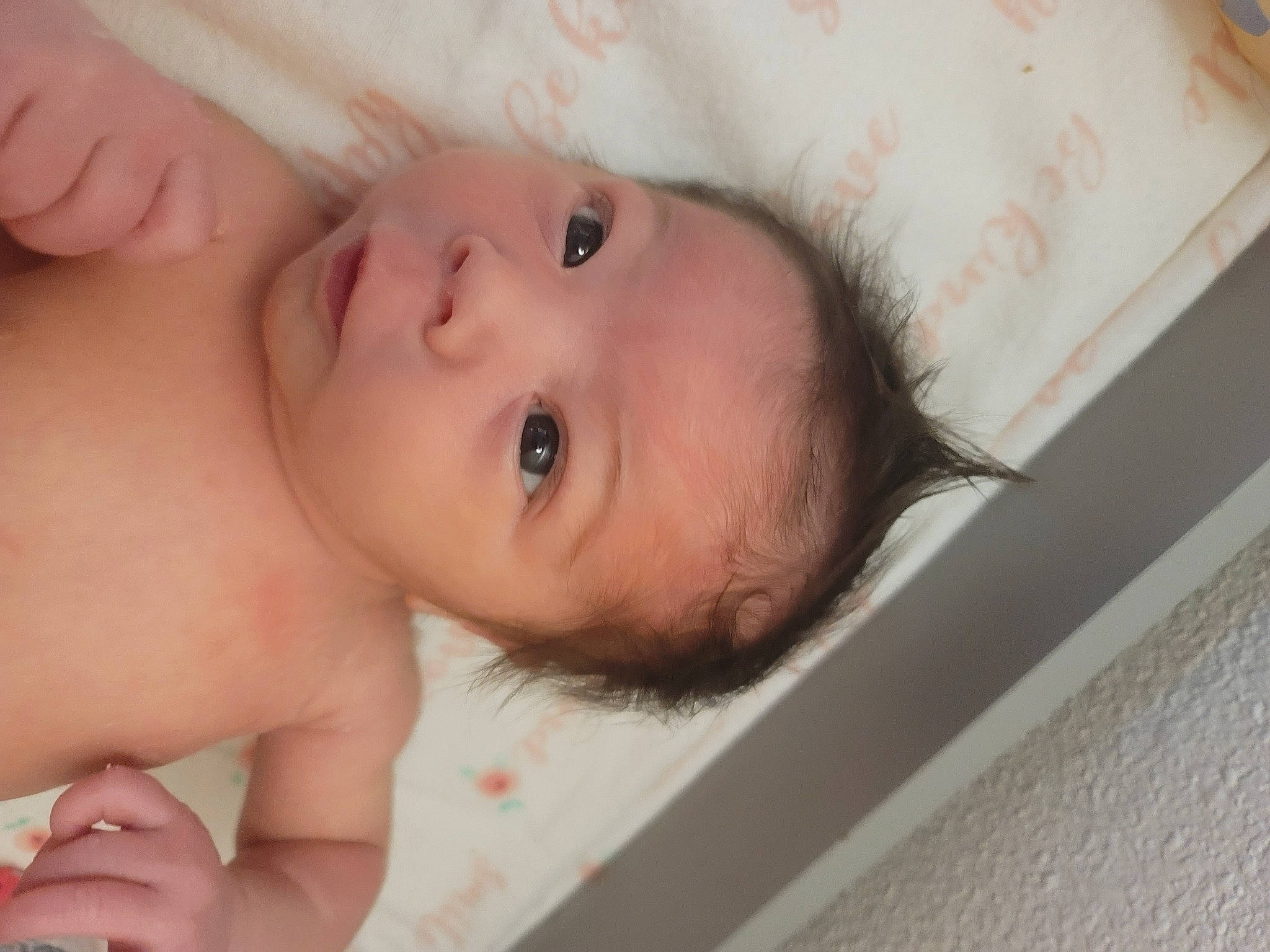 Mara is registered to the contest to win money with this photo: baby, cheek, chin, eye, eyebrow, eyelash, face, finger, gesture, hair, hand, happy, head, iris, lip, mouth, neck, nose, person, skin