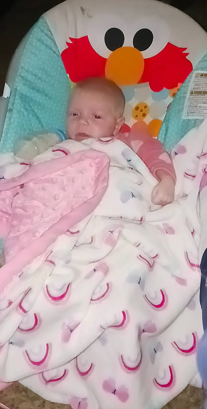 Bella is registered to the contest to win money with this photo: baby, baby_safety, baby_sleeping, baby_toddler_clothing, bedding, cheek, child, comfort, eye, face, head, linens, magenta, person, pink, product, skin, sleeve, textile, toddler