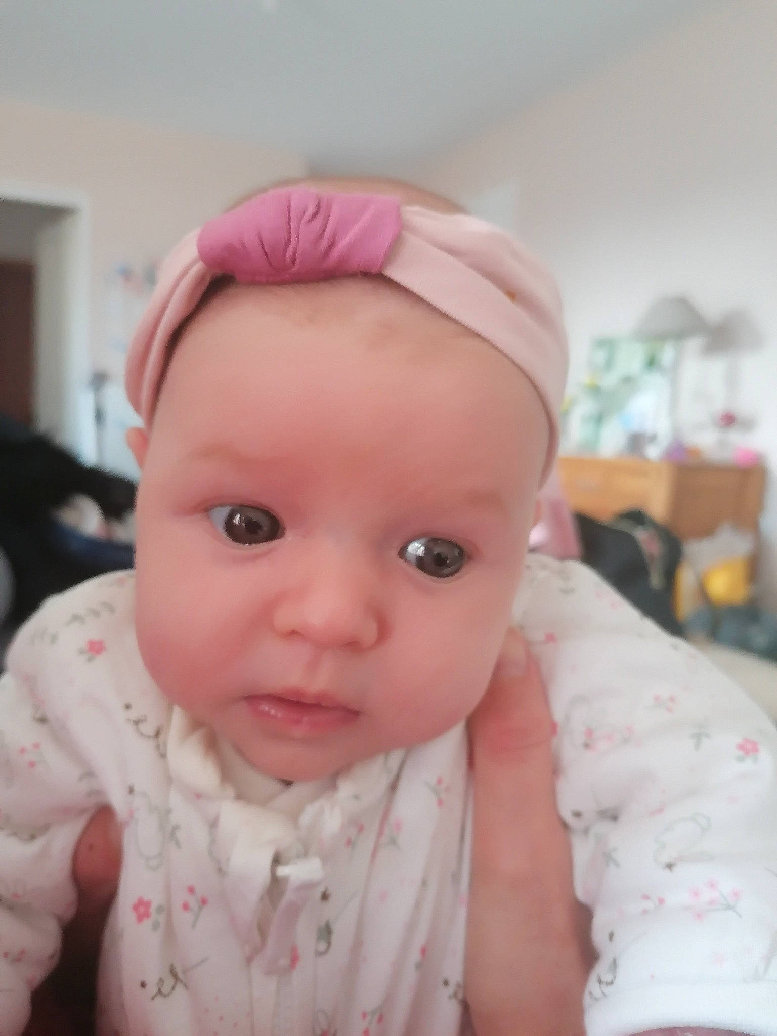 Anaïs a rejoint le concours — aidez-le/la à gagner de superbes lots ! baby, baby_toddler_clothing, cap, cheek, child, ear, eyebrow, eyelash, fashion_accessory, headgear, headpiece, iris, lip, mouth, nose, person, pink, skin, sleeve, thumb