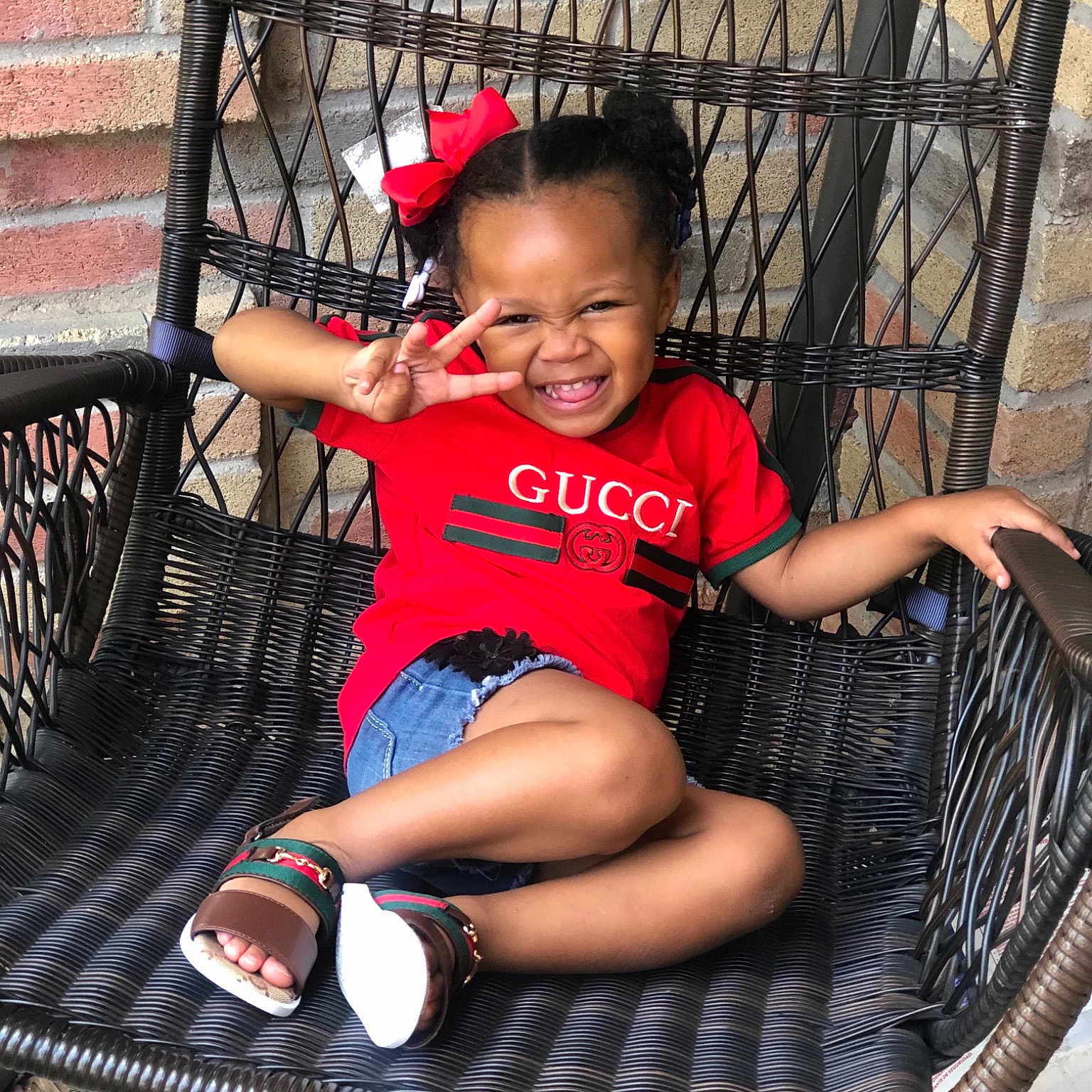 Jewell is registered to the contest to win money with this photo: black_hair, child, fun, joy, leg, leisure, net, person, plant, play, sitting, skin, smile, toddler, tree, vacation