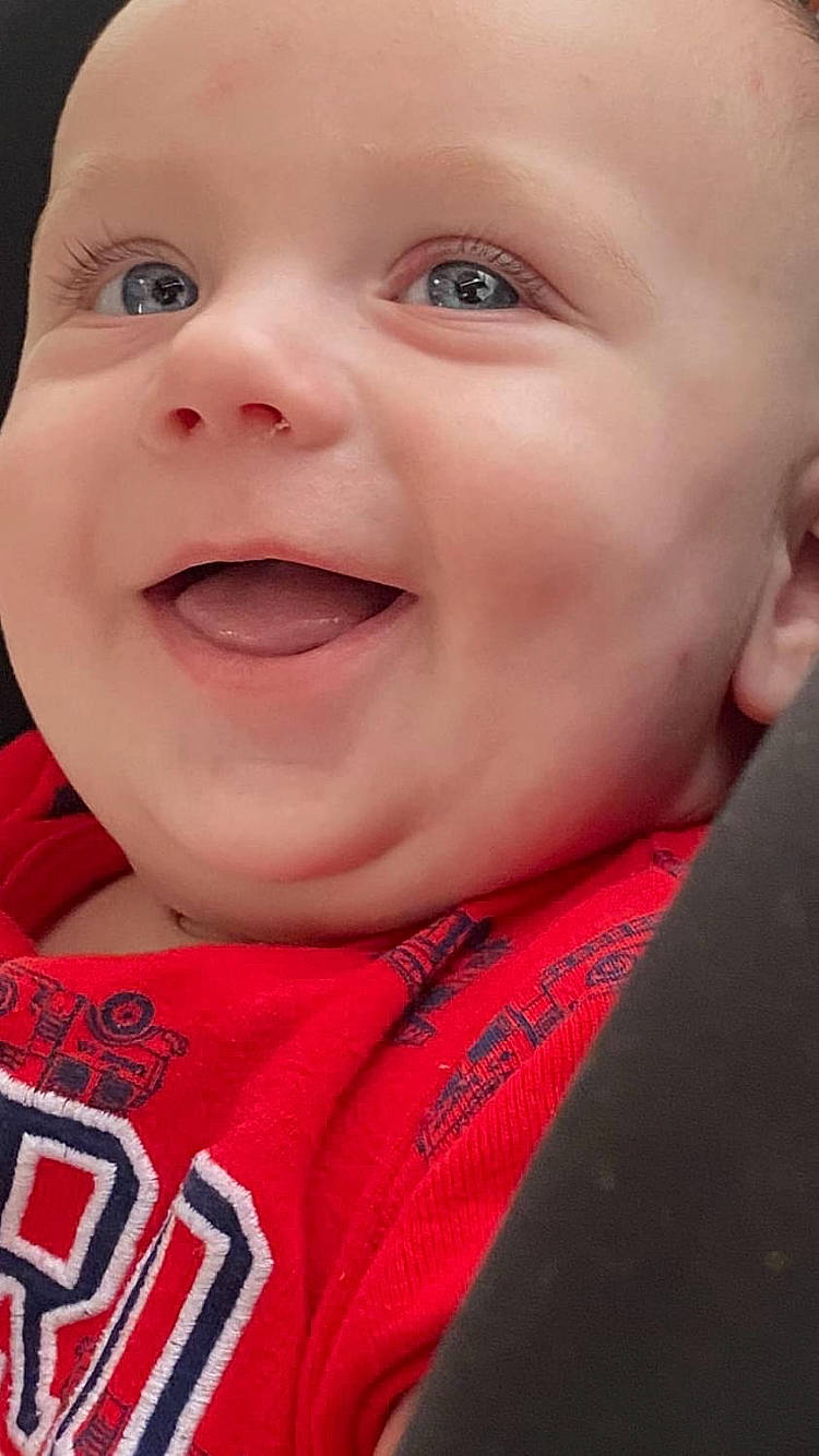 Zayden is registered to the contest to win money with this photo: baby, carmine, cheek, close_up, eye, eyebrow, eyelash, forehead, fun, gesture, happy, iris, lip, magenta, mouth, nose, person, pink, skin, smile