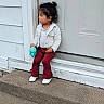 Mia joined the competition — help win amazing prizes! casual, child, concrete, concrete_steps, curly_hair, door, expression, footwear, girl, maroon_pants, outdoor, portrait, residential, side_view, sippy_cup, small_person, steps, waiting, white_jacket, young_child