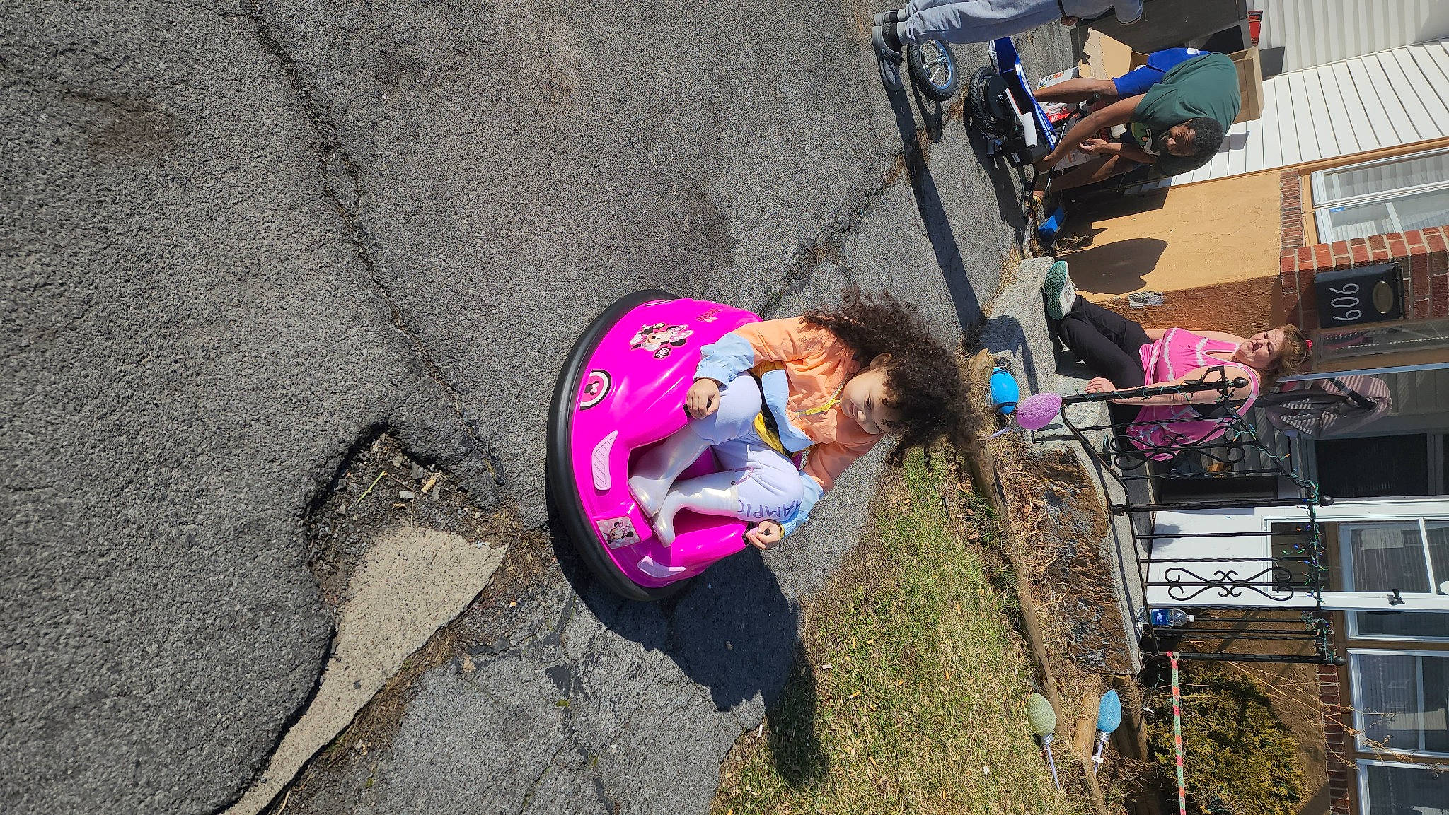 Dalaya is registered to the contest to win money with this photo: adventure, asphalt, automotive_tire, automotive_wheel_system, bicycle_tire, bicycle_wheel, concrete, fun, grass, leisure, magenta, person, recreation, road_surface, soil, spoke, tire, toddler, tree, wall