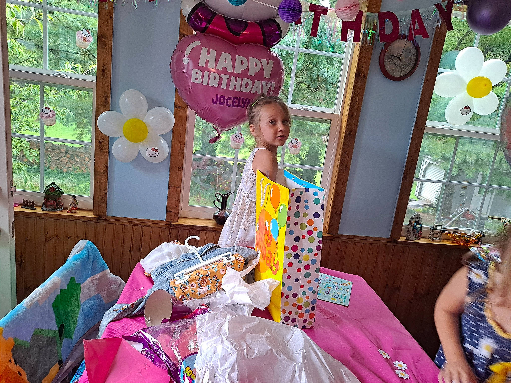 Jocelynn is registered to the contest to win money with this photo: birthday, chair, child, event, fashion_design, fun, happy, leisure, magenta, party, party_supply, person, pink, play, recreation, room, sitting, sweetness, t_shirt, textile