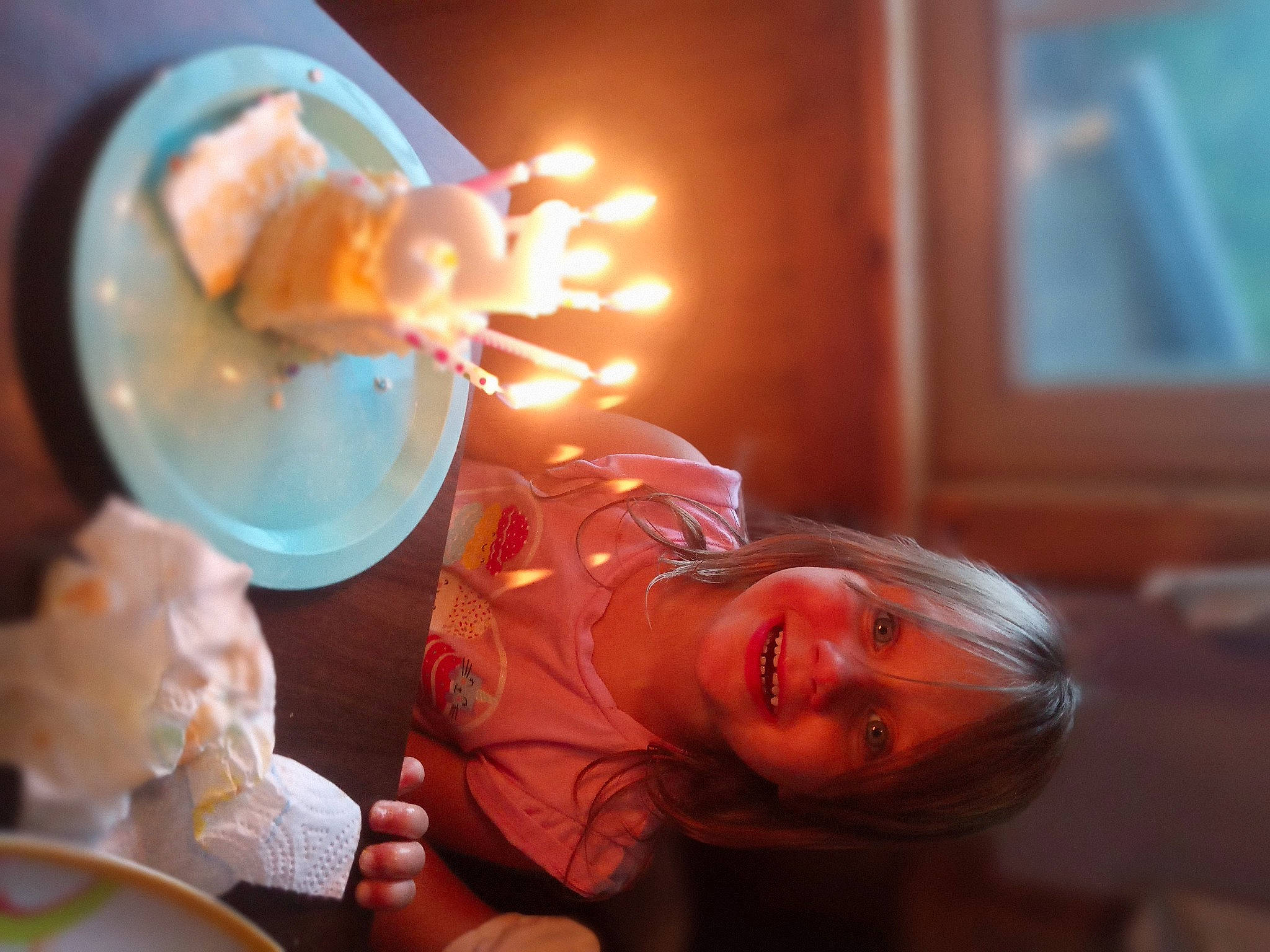 Jocelynn is registered to the contest to win money with this photo: birthday, birthday_cake, candle, child, cooking, cuisine, dessert, dish, event, fire, food, fun, happy, heat, joy, lighting, party_supply, person, plate, smile