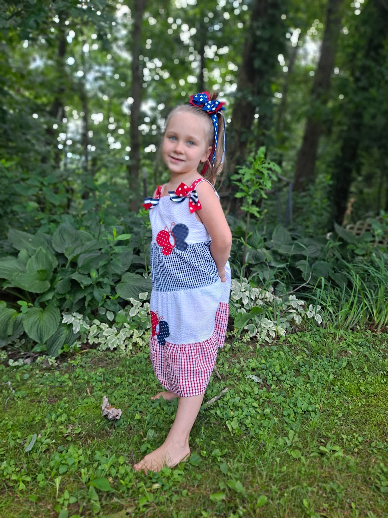 Jocelynn is registered to the contest to win money with this photo: baby_toddler_clothing, child, day_dress, fawn, forest, fun, grass, groundcover, happy, joy, leisure, magenta, meadow, pattern, people_in_nature, person, plant, smile, terrestrial_plant, toddler
