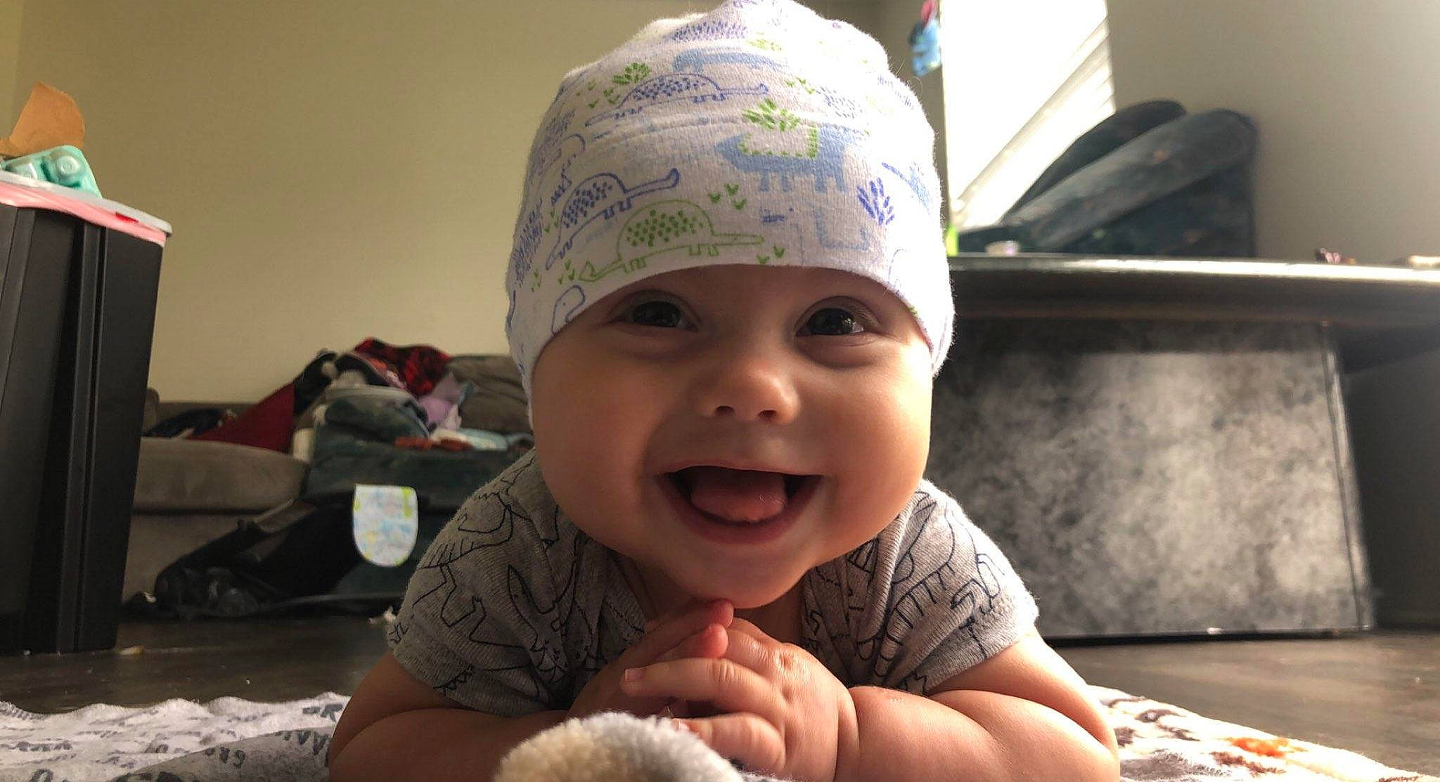 Felix joined the competition — help win amazing prizes! baby, baby_laughing, cap, cheek, chin, clothing, eye, face, finger, fun, gesture, happy, head, headgear, headwear, joy, lip, mouth, nose, person