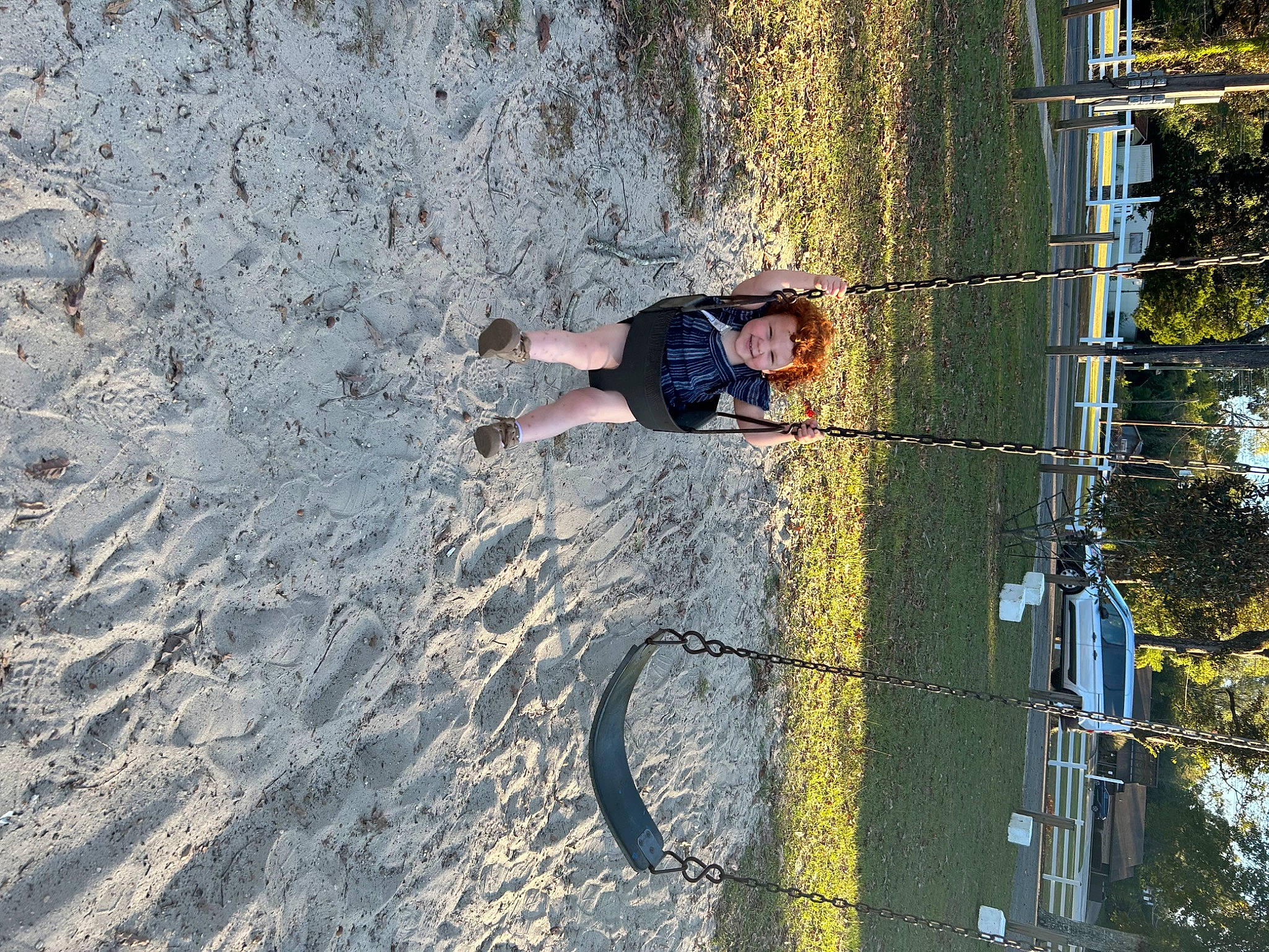 Adalyn is registered to the contest to win money with this photo: adventure, climbing_harness, concrete, fun, joy, landscape, leisure, person, plant, public_utility, recreation, rock_climbing_equipment, rope, shadow, slope, soil, sport_climbing, tree, water, wire