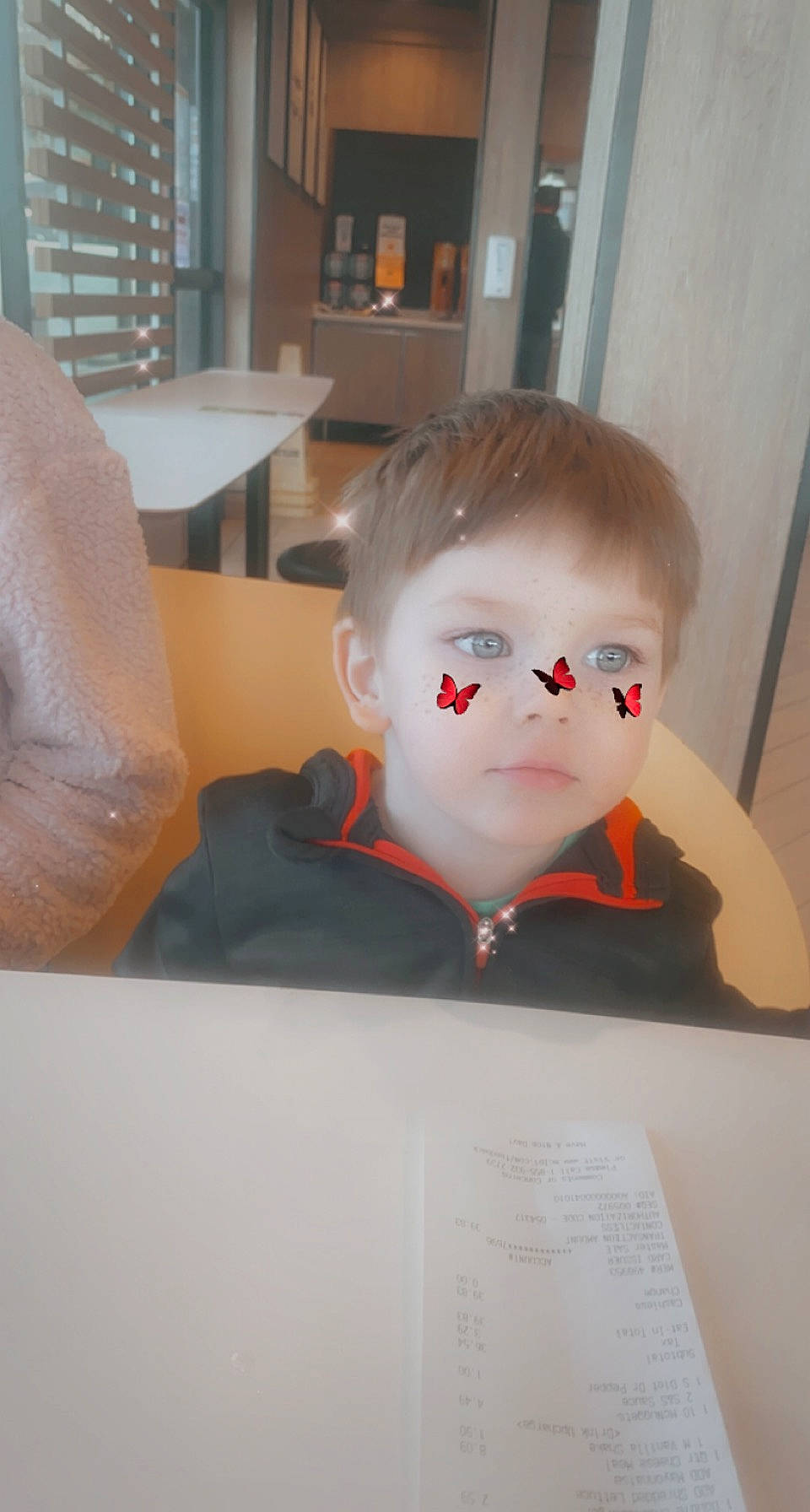 Samuel Henry joined the competition — help win amazing prizes! art, chair, cheek, child, event, eyelash, eyewear, fashion_design, forehead, fun, jaw, nose, paper, person, personal_protective_equipment, room, sitting, table, toddler, visual_arts