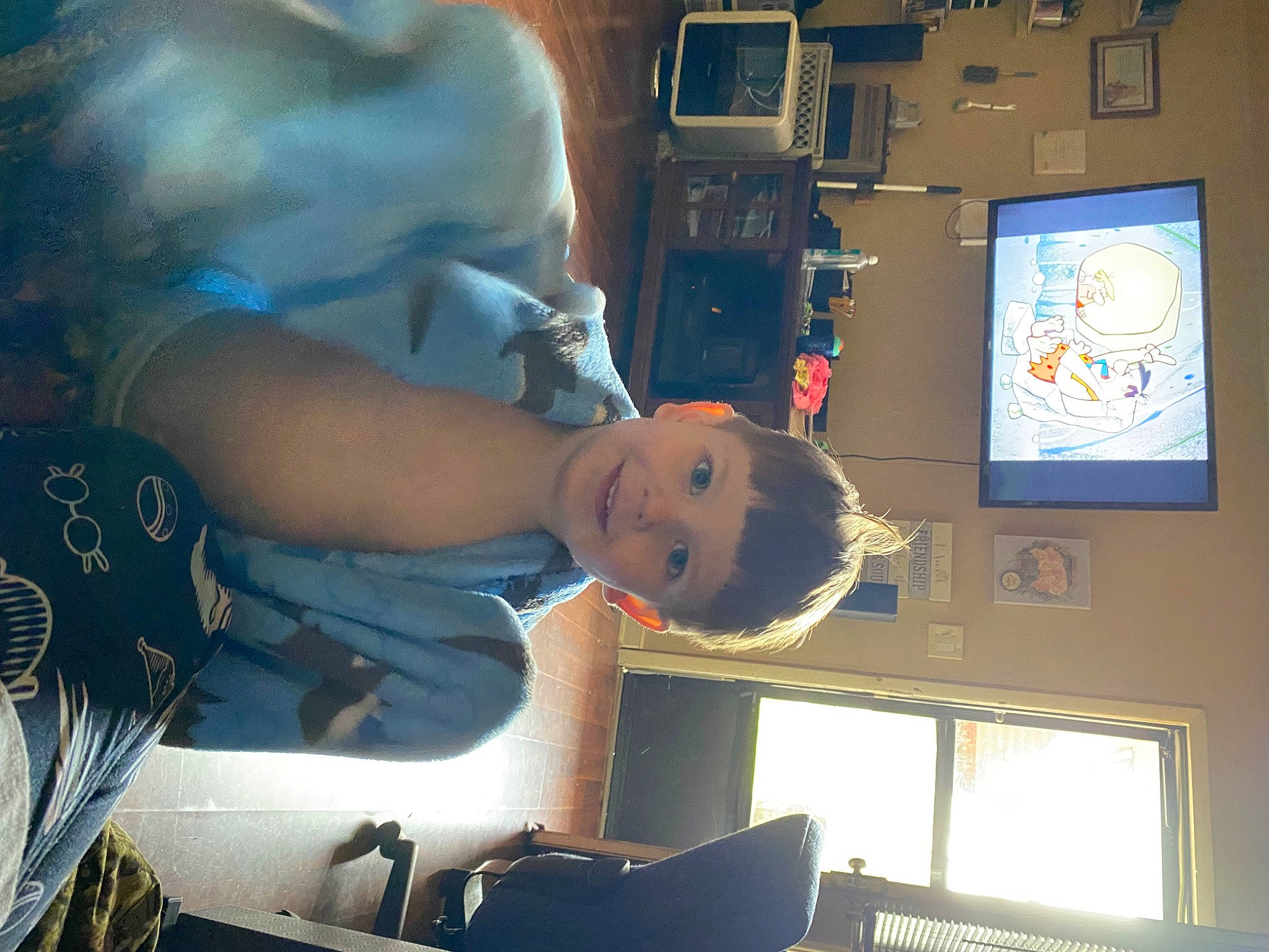 Samuel Henry is registered to the contest to win money with this photo: baby, child, display_device, elbow, electric_blue, fun, joy, machine, person, room, t_shirt, toddler, window