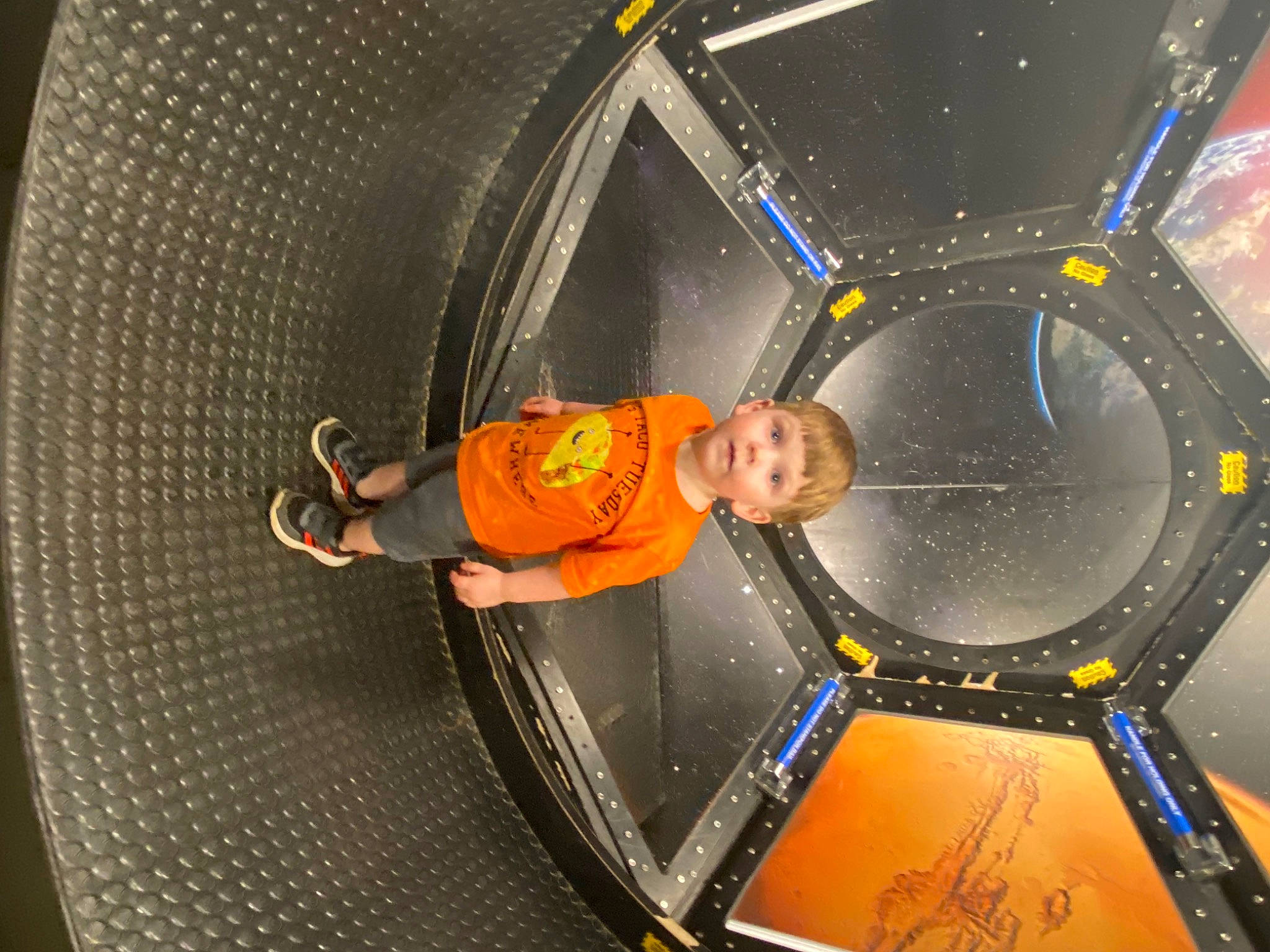 Samuel Henry is registered to the contest to win money with this photo: auto_part, automotive_design, automotive_exterior, automotive_lighting, automotive_tire, automotive_wheel_system, engineering, fixture, flash_photography, fun, hood, hubcap, motor_vehicle, person, rim, smile, space, spoke, t_shirt, vehicle_door