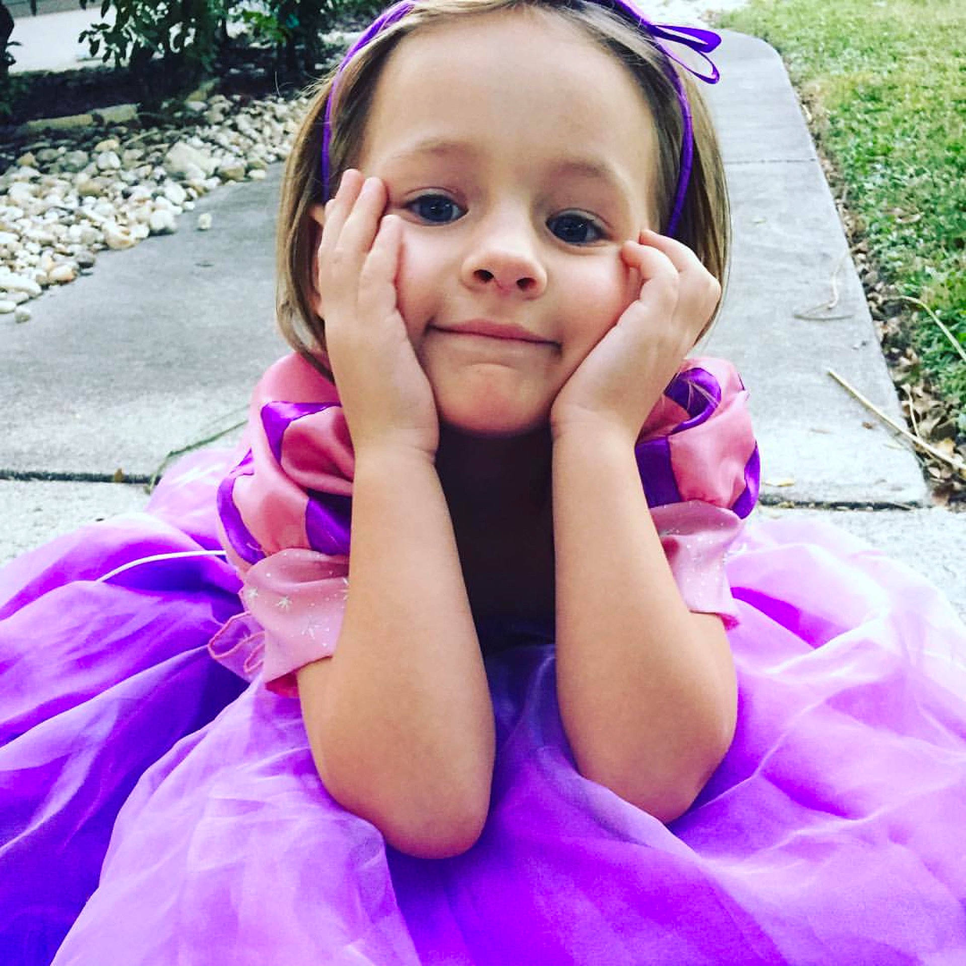 Milah is registered to the contest to win money with this photo: beauty, child, clothing, dress, eye, face, facial_expression, girl, head, human_positions, image, infant, lady, person, photography, pink, purple, skin, smile, toddler