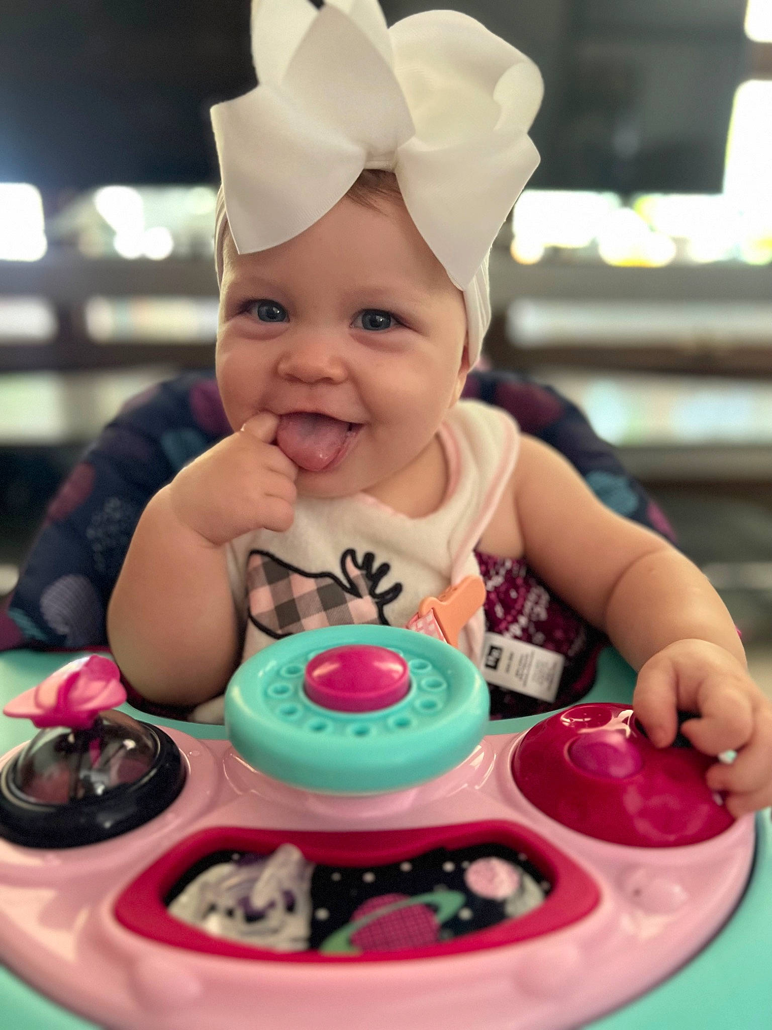 Dahlia is registered to the contest to win money with this photo: baby, baby_toddler_clothing, beauty, cheek, child, facial_expression, finger, fun, green, happy, headwear, joy, organ, person, photograph, pink, skin, smile, snapshot, sweetness