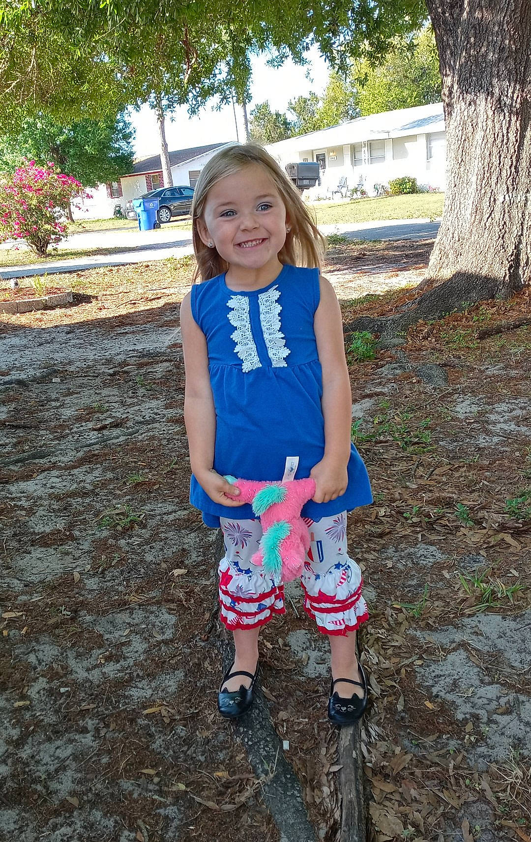 Kyndall is registered to the contest to win money with this photo: child, electric_blue, face, fun, grass, happy, head, human_leg, joy, knee, leaf, leg, leisure, person, plant, smile, sock, street_fashion, t_shirt, thigh