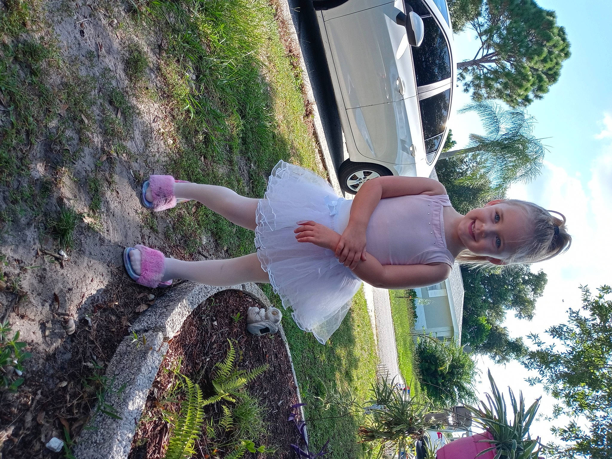 Kyndall joined the competition — help win amazing prizes! automotive_exterior, botany, car, child, cloud, fun, grass, happy, joy, landscape, leisure, light, people_in_nature, person, plant, recreation, sky, summer, sunlight, tree