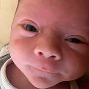 Christopher joined the competition — help win amazing prizes! baby, newborn, infant, face, closeup, portrait, eyes, nose, mouth, cheeks, expression, onesie, clothing, skin, forehead, head, bedding, soft_light, sleepy, adorable