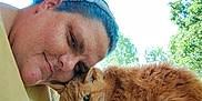 Buttons joined the competition — help win amazing prizes! person, cat, orange_cat, outdoor, greenery, trees, daylight, affection, selfie, headband, tattoo, fur, pet, nature, closeup, friendship, smile, collar, bench, cuddling
