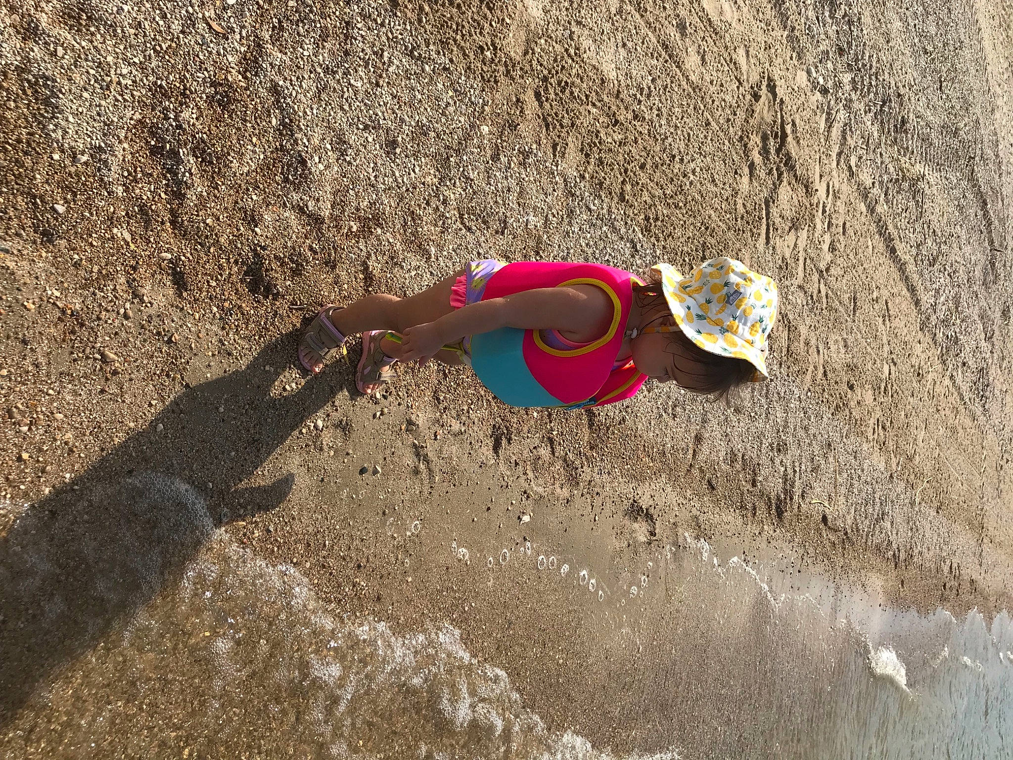 Lola is registered to the contest to win money with this photo: beach, carmine, extreme_sport, eyewear, fashion_accessory, fun, happy, hat, landscape, leisure, people_in_nature, person, personal_protective_equipment, recreation, sand, shadow, slope, soil, sun_hat, travel