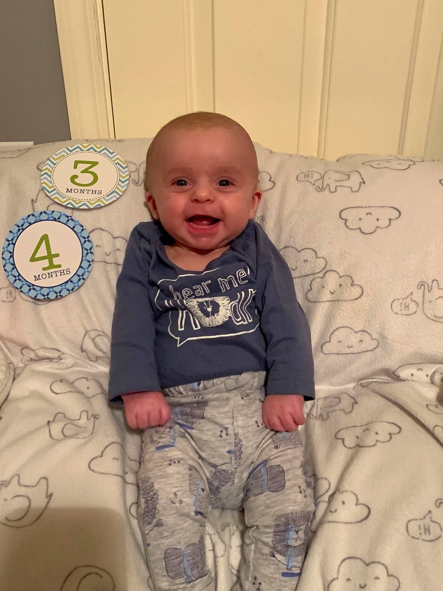 Grayson is registered to the contest to win money with this photo: arm, boy, child, cool, day, facial_expression, infant, person, product, sitting, skin, smile, standing, t_shirt, textile, toddler