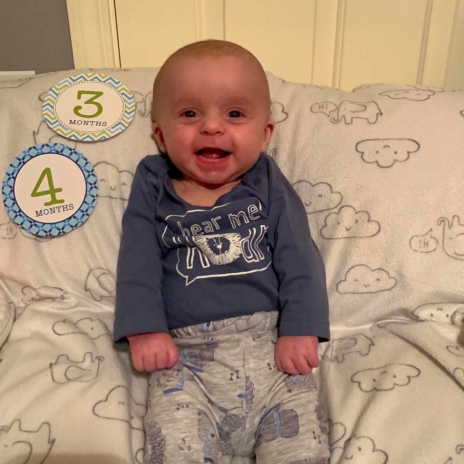 Grayson is registered to the contest to win money with this photo: arm, boy, child, cool, day, facial_expression, infant, person, product, sitting, skin, smile, standing, t_shirt, textile, toddler
