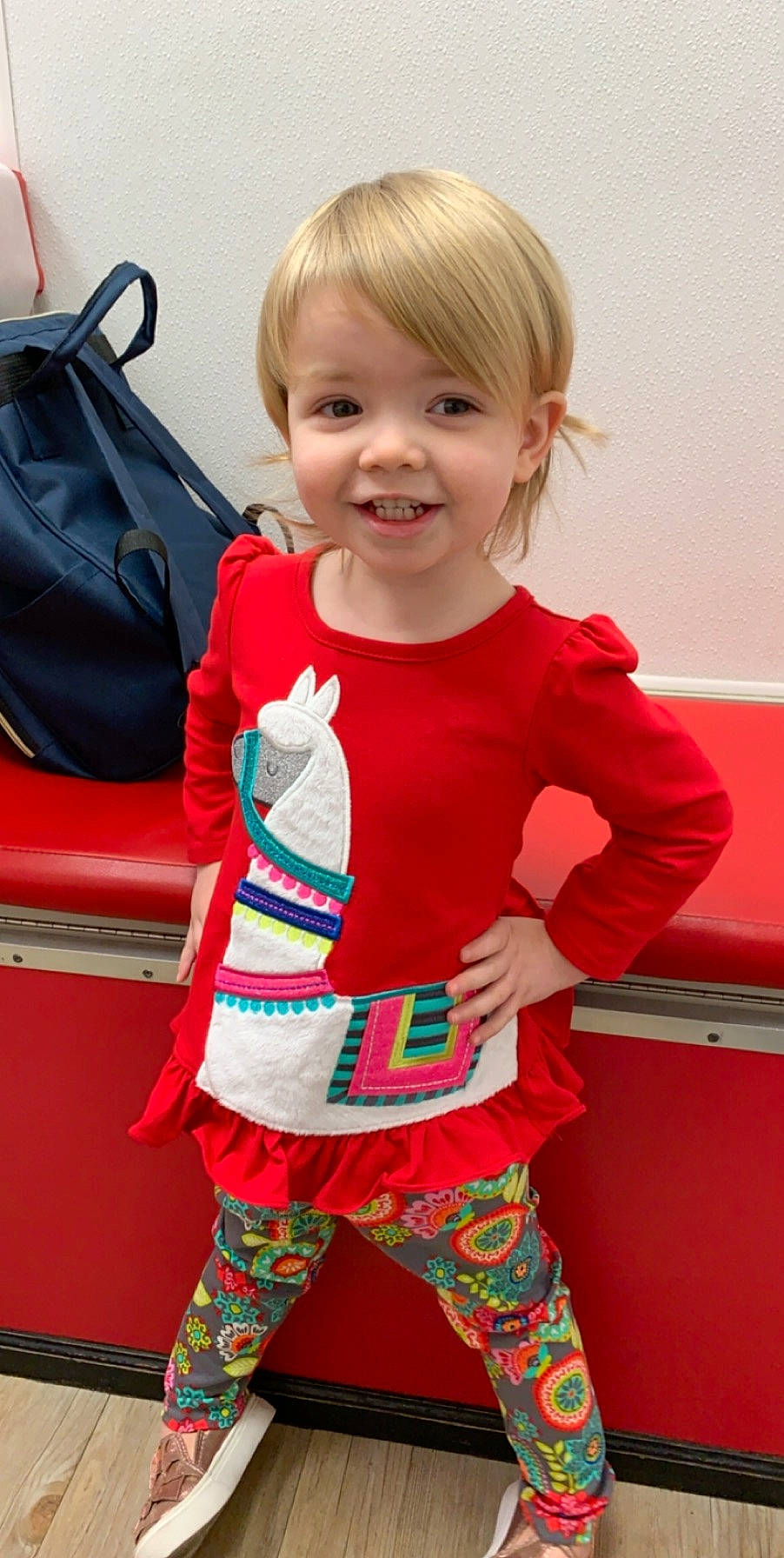 Lyla is registered to the contest to win money with this photo: baby_toddler_clothing, cheek, child, clothing, joy, outerwear, person, play, sleeve, smile, standing, toddler