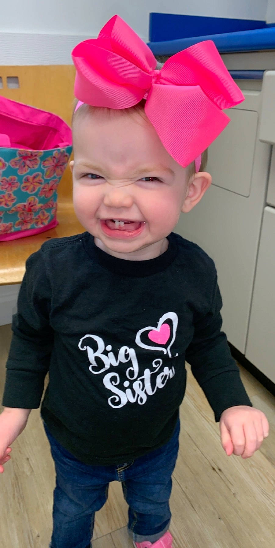 Lyla is registered to the contest to win money with this photo: baby_toddler_clothing, cap, child, clothing, cool, ear, headgear, joy, person, pink, play, sleeve, smile, t_shirt, toddler