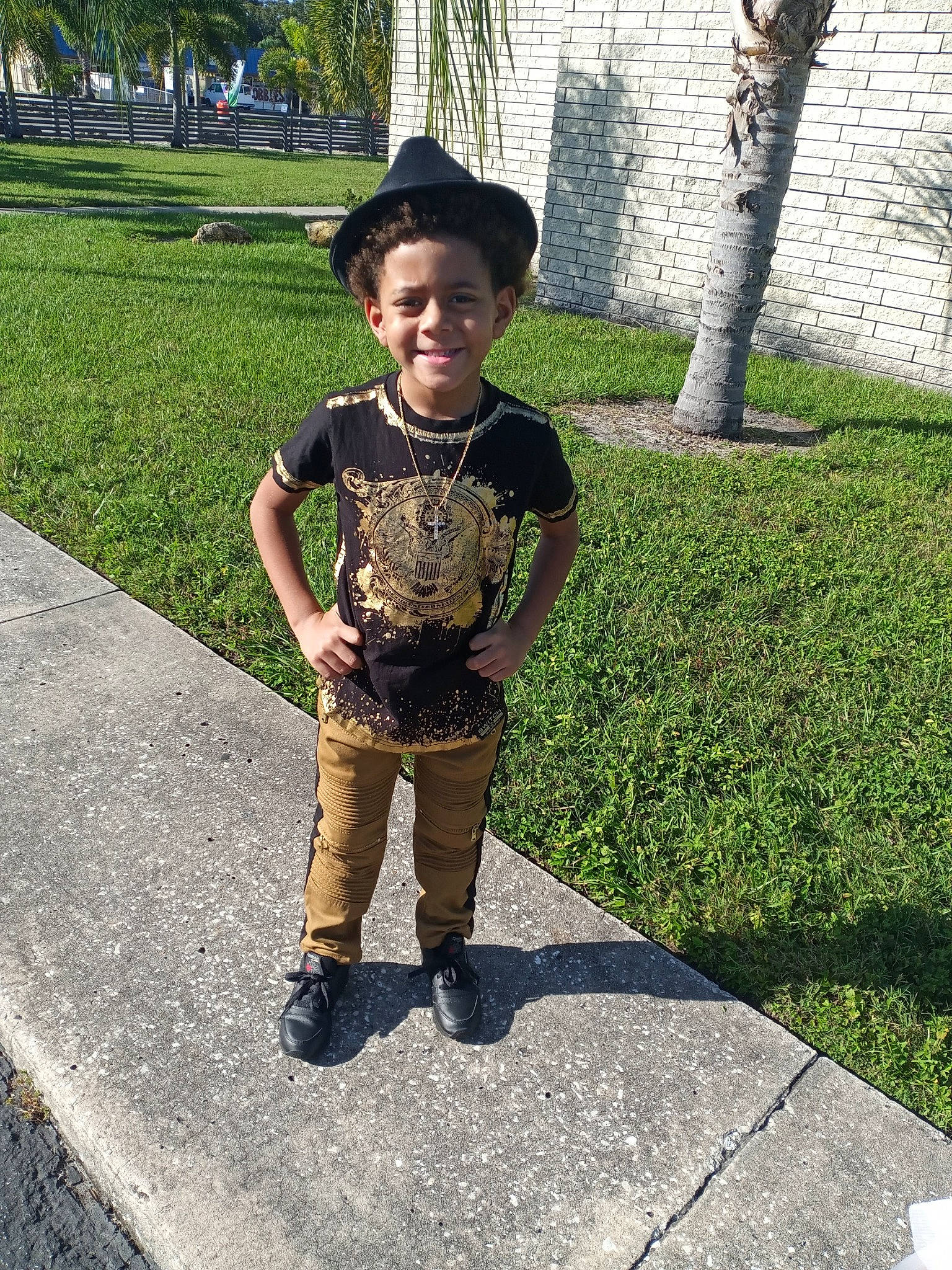 Junior joined the competition — help win amazing prizes! asphalt, eyewear, grass, happy, hat, headgear, joy, lawn, leisure, people_in_nature, person, plant, recreation, road_surface, sidewalk, sleeve, smile, street_fashion, sun_hat, toddler