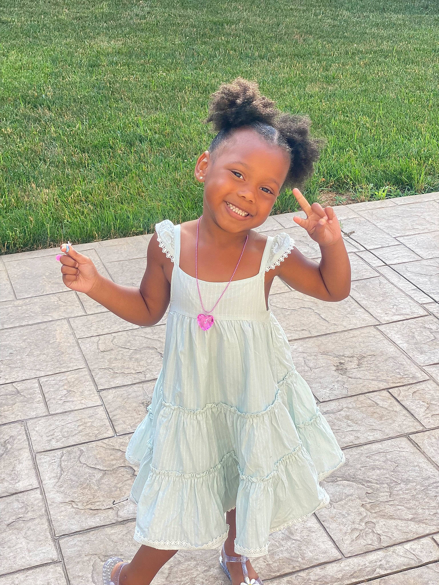 Journi joined the competition — help win amazing prizes! baby_toddler_clothing, day_dress, dress, eye, fun, gesture, grass, hair, hand, happy, head, joy, leisure, people_in_nature, person, pink, plant, skin, sleeve, smile