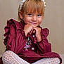 black_shoes, blonde_hair, burgundy, child, cute, dress, floral_embroidery, girl, happy, headband, neutral_background, patterned_tights, portrait, pose, ruffles, sitting, smile, studio, tights, white_tights