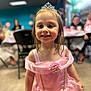 Gracelyn joined the competition — help win amazing prizes! child, girl, princess, tiara, pink_dress, smile, party, indoor, celebration, portrait, happy, young_child, costume, dress_up, person, cute, fun, event, people, background