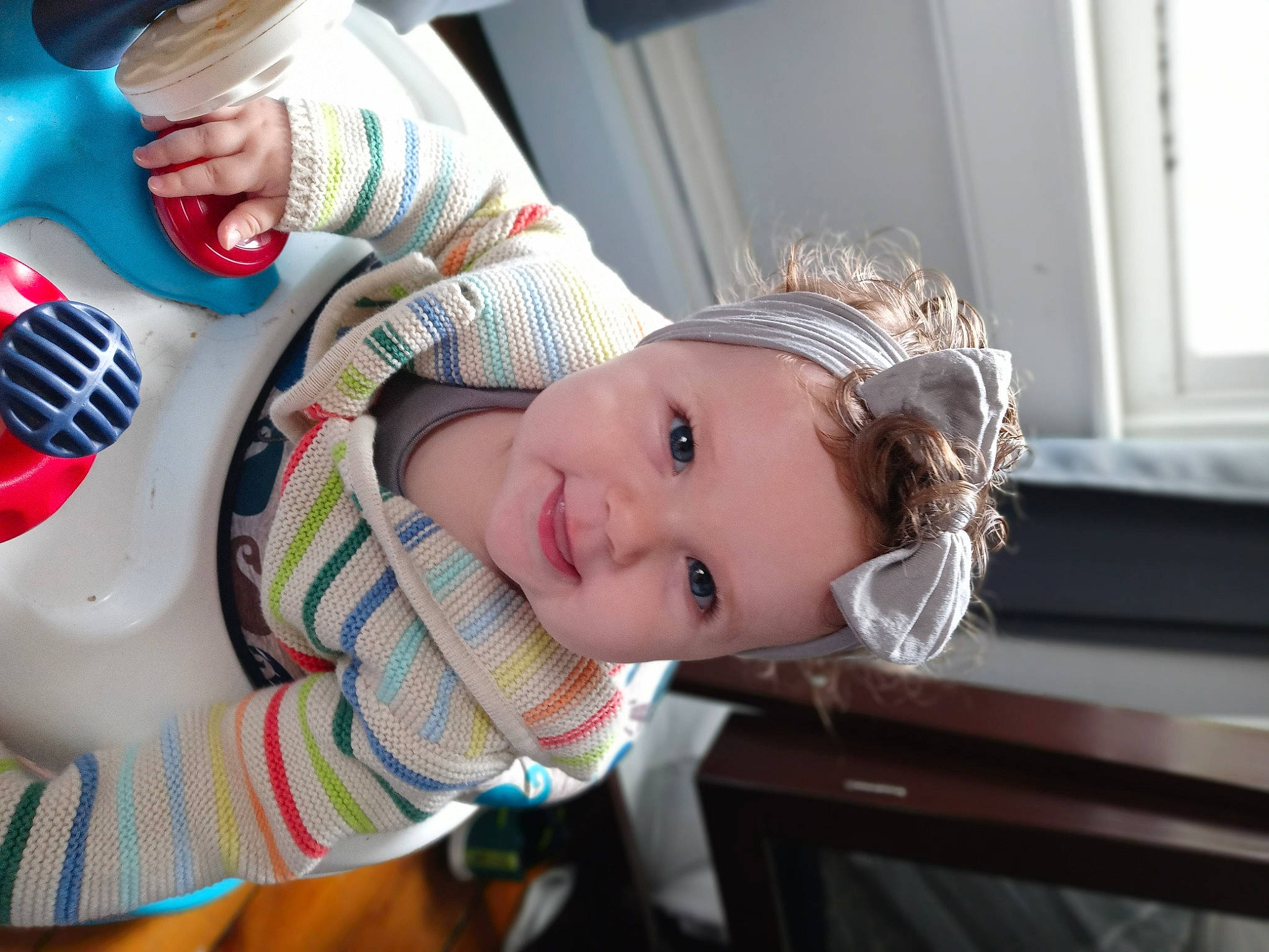 Quinn is registered to the contest to win money with this photo: auto_part, baby, baby_products, carmine, child, eyewear, fashion_accessory, fun, happy, luxury_vehicle, nail, person, sitting, skin, smile, toddler, toy, vacation, window