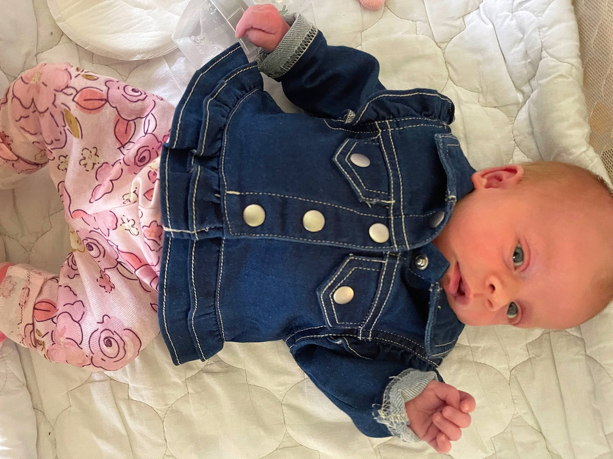 Lidia is registered to the contest to win money with this photo: arm, baby, baby_toddler_clothing, bedding, button, child, clothing, collar, comfort, denim, dress_shirt, fashion_accessory, hand, linens, pattern, person, product, skin, sleeve, textile