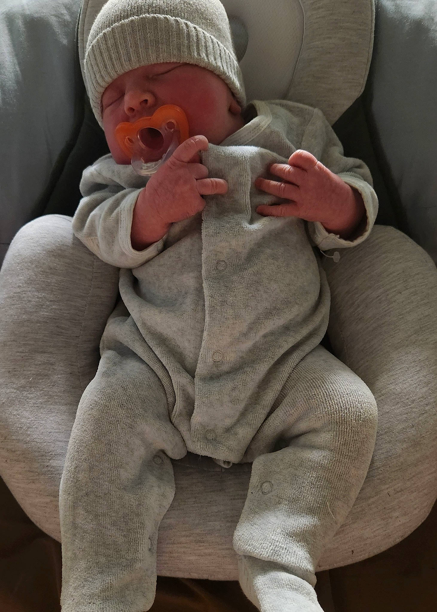 Evie joined the competition — help win amazing prizes! baby, baby_toddler_clothing, cap, cheek, child, comfort, face, finger, foot, gesture, head, headwear, human_body, human_leg, knee, person, skin, sleeve, thigh, thumb